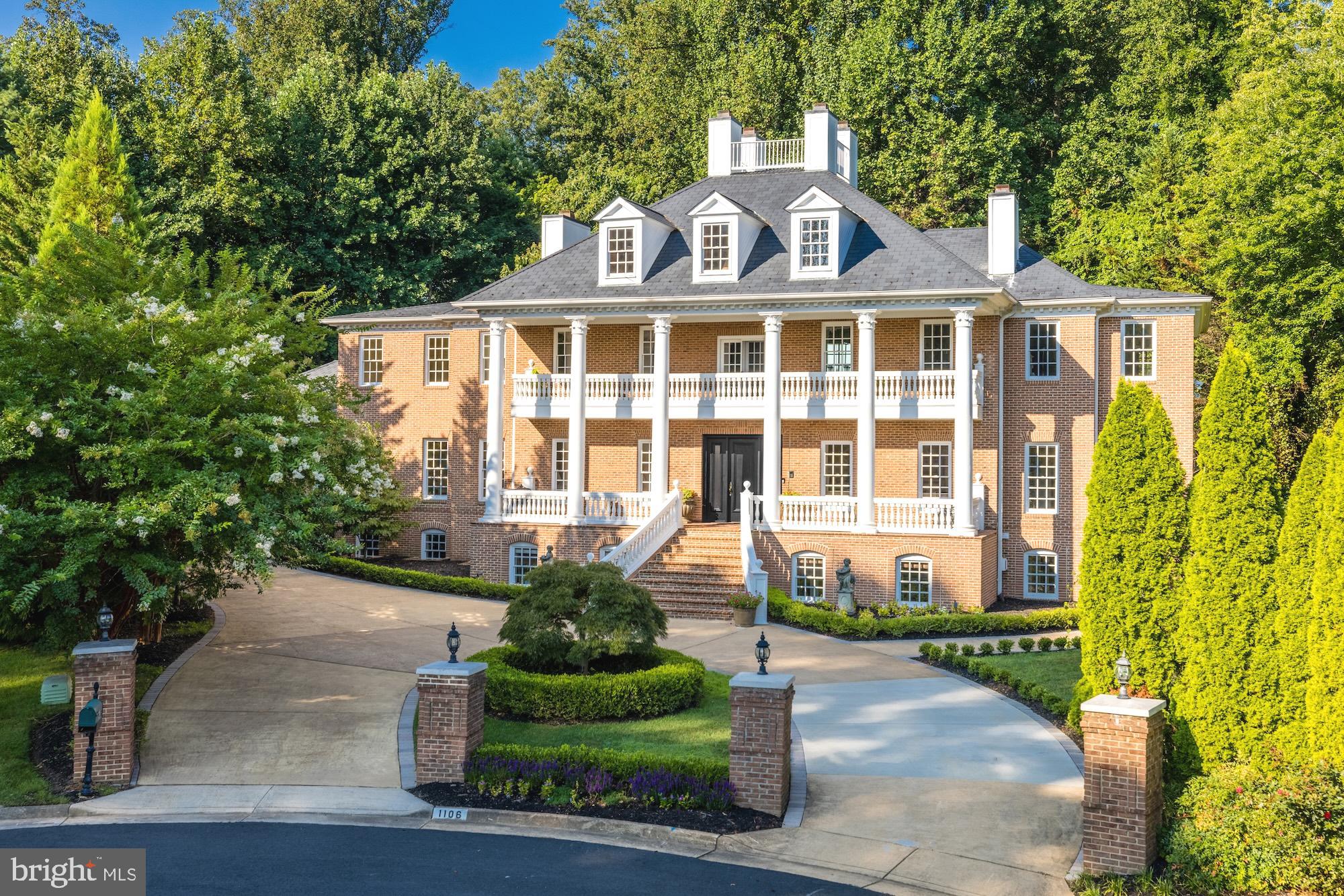 Introducing an extraordinary McLean estate that blends timeless architecture with resort-style living.   Sited on a beautifully landscaped lot, this grand brick residence offers more than 10,000 sq ft of refined interior space, multiple entertaining zones, and a backyard oasis designed for year-round enjoyment. Thoughtfully updated throughout, the home showcases sophisticated finishes, soaring ceilings, and luxurious amenities that elevate everyday living.
The moment you step inside, the home enchants with 10’ ceilings, refinished hardwood floors, elegant crown moldings, and a dramatic 20’ Grand Salon wrapped in two-story windows overlooking the pool deck. With 4 fireplaces, dual laundry rooms, and a built-in speaker system across all levels, every detail of this residence has been crafted for comfort, beauty, and function.
The gourmet kitchen is a chef’s dream renovated with quartz countertops, Wolf 5-burner cooktop, Thermador double ovens, upgraded sinks and fixtures, two dishwashers, Sub-Zero refrigeration, and a custom walk-in pantry with a secondary refrigerator. The main level continues with an elegant office, private guest suite, marble-floored foyer, and seamless flow to outdoor living spaces.
The upper level hosts a magnificent primary suite with a private sitting room, gas fireplace, sprawling custom walk-in closet, and a spa bath with steam shower, jetted tub, dual vanities, and bidet. Four additional bedrooms each feature private en-suite baths and custom closet systems.
The lower level is an entertainer’s haven complete with a newly renovated recreation room, wet bar, gas fireplace, fitness room, sauna, steam room, yoga/massage/flex rooms, cedar closet, and two more bedrooms.
Outside, the property transforms into a private resort featuring a heated in-ground pool with endless swim machine, 2,000 sq ft travertine patio, upgraded gazebo with outdoor wet bar, and lush professional landscaping.
No detail has been overlooked. This home embodies luxury, comfort, and sophistication at every turn.