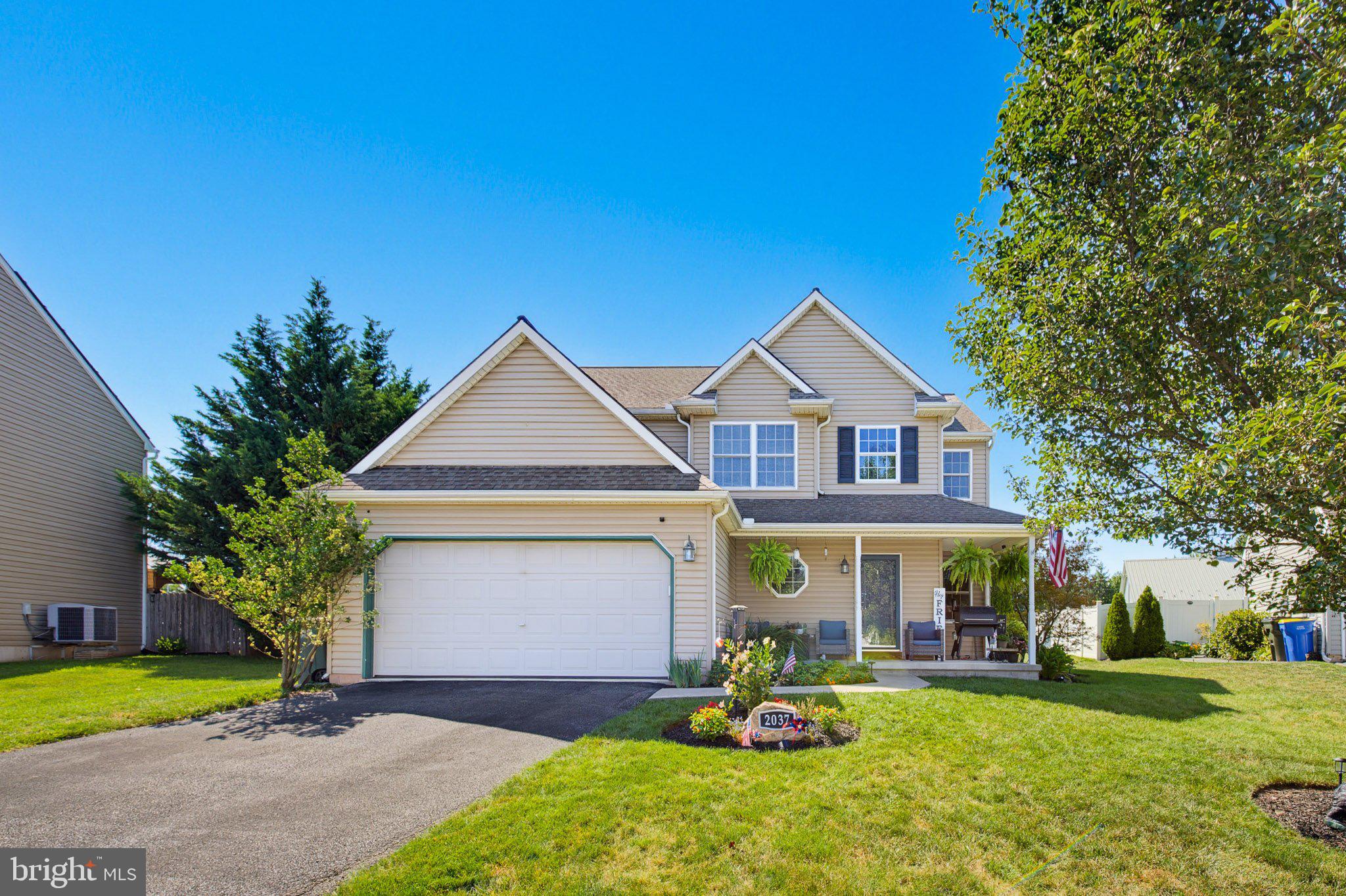 Welcome to 2037 Wood Hall Way, a beautifully maintained 4-bedroom, 2.5-bathroom two-story home in Dover that offers the perfect blend of everyday comfort and high-end entertaining space. From the moment you pull up the wide paved driveway to the attached two-car garage, the home’s exceptional curb appeal and pride of ownership shine through. The exterior boasts timeless siding complemented by crisp white trim and dark shutters, picturesque front landscaping complete with a serene koi pond, and a custom address stone that sets a warm tone before you even reach the front porch. The spacious, covered front porch provides plenty of room for seating, making it an inviting spot to sit back and relax.

Inside, the thoughtfully designed floor plan is bright, spacious, and filled with exceptional attention to detail throughout, offering plenty of room for family and guests. Retreat to your huge primary suite, an expansive private sanctuary featuring a generous walk-in closet with abundant storage space, accompanied by three additional well-appointed bedrooms. The luxury continues downstairs in the finished basement, which boasts a custom-built lower-level bar setup—making it the ultimate retreat for hosting game nights, celebrations, or simply unwinding on the weekends.

Step outside into your personal outdoor living space and fully landscaped grounds that offer endless room to play, relax, or entertain. Designed as a true backyard oasis, the back of the home features a covered patio equipped with ceiling fans, outdoor TV hookups, and privacy/sun shades so you can comfortably host game days and summer gatherings in any weather. An elegant paver walkway leads through the yard to a dedicated outdoor fire pit area, perfect for taking in some of the absolute best sunsets Pennsylvania has to offer under the open evening sky.

**Seller is a PA licensed Real Estate agent**