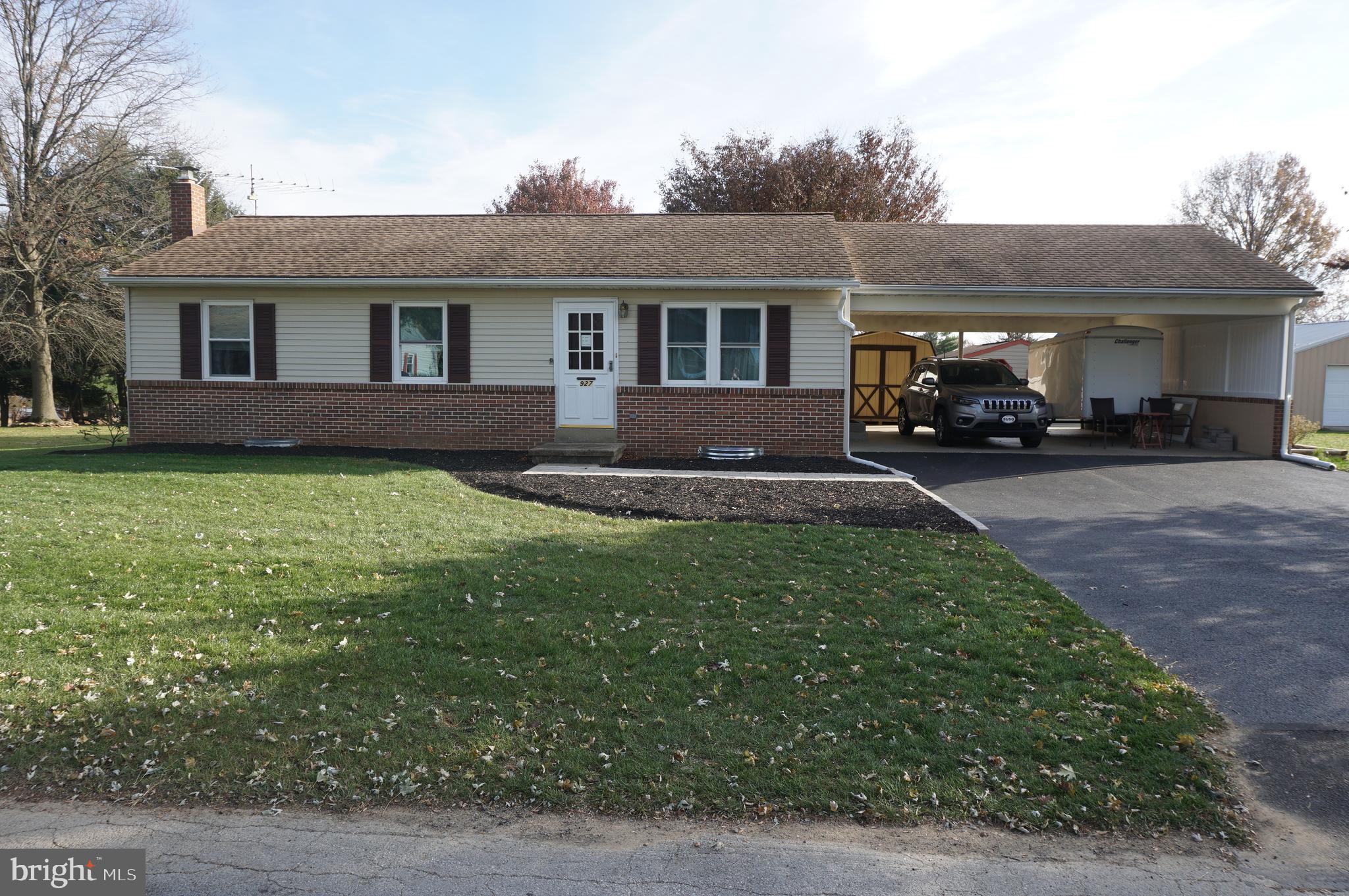 Wonderful Country Setting for this Lovely Home.  Beautiful Yard with Over sized 2 Car Carport  and 2 Sheds,  Inside you will find very nice Hickory Hardwood Flooring in Living Room and Hall Way.  Porcelain Tile Flooring in the Spacious Kitchen.  ( Appliances Convey) with Wains Coating.  Super Spacious Family Room off Kitchen has Energy Efficient Argon Windows and 1/2" Creek Bed Stone Flooring. (A Must See).  Bathroom is Handicapped Equipped with a Walk In Jacuzzi Tub/Shower.  3 Bedrooms on the Main Level.  House has thermal pain windows as well.   Basement is partially finished providing additional living space.   This Home has updated furnace, central air conditioning a newer roof.   VERY SOLID HOME.