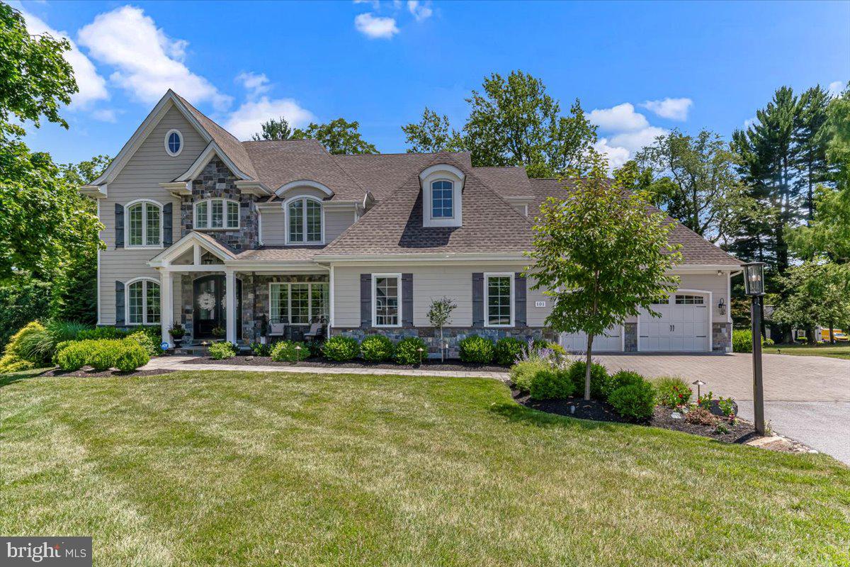 2020 HBA Award Winner “Lafayette” by Megill Homes is available for sale. Sited on 2+ acres in Chester County’s Thornbury Township, Rokeby Farm Lane is home to 4 unique custom luxury homes on large lots, and is concealed from South Concord Road by historic stone walls, punctuated with elegant gates. 101 Rokeby Farm welcomes you with a covered flagstone front porch and arched mahogany french doors. Inside, a parlor with lineal wall fireplace, a wall of custom built-in cabinetry, window seats. 9’ barn doors reveal wet bar. Family Room features box beam coffered ceiling, quarried stone fireplace, loads of natural light. Offset from kitchen by informal dining area, sliders to Timbertech deck. Kitchen will delight the luxury buyer with 48” Wolf Range w/dual ovens, powerful exhaust, abundant LED lighting. A rare white granite gorgeously complements the white Century cabinets. Undermount microwave, farmhouse Kohler sink, SubZero fridge. Formal dining room w/shadowbox trim and custom paint. Note how lighting fixtures are installed w/trim detailing. Mudroom access to the 2 deep and high garages (for a total of 3 bays) where you will find a bench with cubbies, huge coat closet, secondary access to deck. Main living level is completed with a substantial home office or guest suite with walk-in shower, private balcony, and walk-in closet with custom organizers. The upper level owner’s suite is a welcome change from the typical. The master bedroom is a cocoon of tranquility, large enough to comfortably accommodate a king size bed and furniture. The owner’s suite lounge (boudoir?) is a private den with wet bar, wine fridge and barn doors that reveal two substantial dressing rooms with custom closets. From the lounge, access the master bathroom with freestanding tub, walk-in shower with designer tile and frameless doors, and totally separate furniture grade vanities with granite tops. Three additional guest rooms complete the upper level: one with en-suite bath and walk-in closet, and two that share a jack-n-jill bath. The walkout lower level offers thoughtful use of finished and unfinished space. There is also a highly detailed wet bar, fridge, and full bathroom with walk-in shower. *Note the dimensions of the oversized garages! These are not typical sized garage bays.* Located near route 202 and 1 commuter routes, 30 minutes to to PHL. Nearby shopping includes Whole Foods, Target, Costco, Wegman’s, Anthropologie, and more. QBW Builder’s Warranty Transfers to New Owner. Showings by Listing Agent. Financially Qualified buyers only.