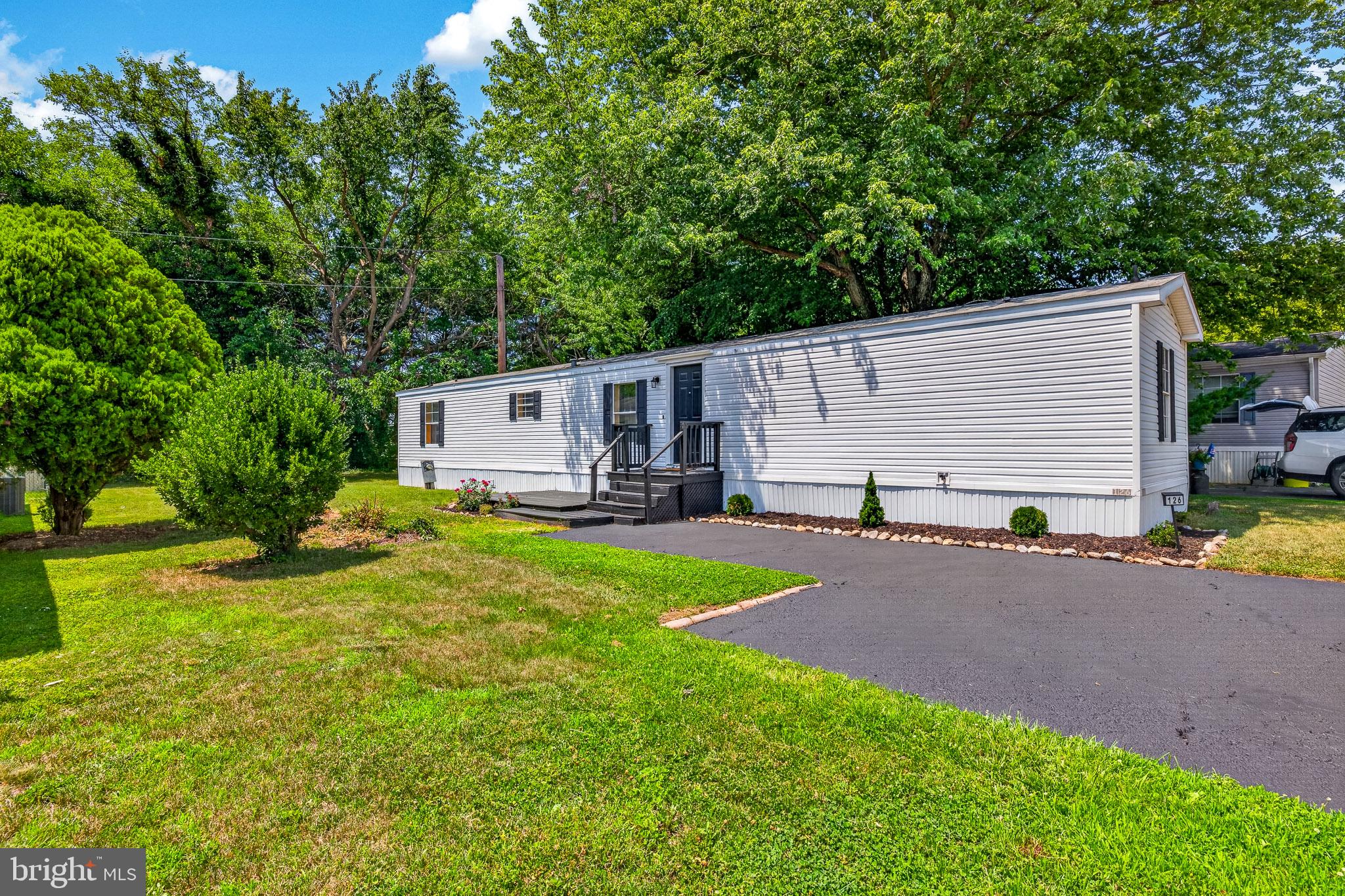 Welcome to 126 Boxwood Rd in the desirable Village Brook community!

This spacious 2002 Liberty single-wide offers 2 bedrooms, 2 full bathrooms, plus a versatile office/flex room that can easily function as an additional 3rd bedroom, all within an impressive 70’ x 15’ layout designed for comfortable everyday living.

Step inside to find a bright, open floor plan featuring updated laminate vinyl plank flooring throughout most of the home, brand new carpeting in the bedrooms, fresh paint, and a completely refreshed feel from top to bottom.

The updated kitchen is the heart of the home, showcasing modern cabinetry, stylish backsplash, and ample counter space, all flowing seamlessly into the main living area, perfect for both entertaining and relaxing. An additional office or flex room provides extra versatility for working from home, hobbies, or guest space.

Both bathrooms have been fully updated, and a dedicated laundry area adds everyday convenience.

Outside, enjoy the charming front and rear decks, ideal for morning coffee or winding down in the evening, as well as a spacious driveway that accommodates up to three vehicles. A storage shed offers additional space for tools and outdoor equipment.

Located in the Appoquinimink School District and just minutes from shopping, dining, and major conveniences, this home combines comfort, updates, and location.

Qualified buyers may qualify for financing with as little as 5% down and a possible monthly payment as low as approximately $1,650, including the current $908 monthly lot rent. Financing terms, rates, lot rent, and buyer qualifications vary. Contact your lender for details. 

Whether you’re looking to downsize or find a low-maintenance lifestyle, this move-in ready home is a fantastic opportunity.

Don’t miss your chance. Schedule your tour today!