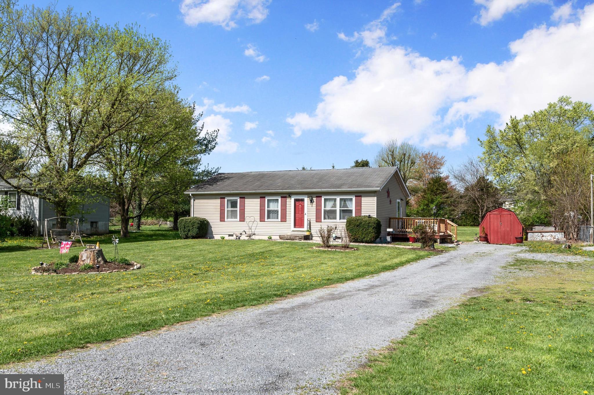 Charming One-Level Living Near the Virginia Border.  Conveniently located just minutes from Interstate 81 and close to the Virginia border, this well-maintained one-level home offers both comfort and accessibility—perfect for commuters and anyone looking to enjoy peaceful living with easy access to amenities.  Step outside to a spacious, flat yard ideal for backyard sports, future pool plans, or entertaining large gatherings. Whether you're hosting friends or enjoying quiet time, the outdoor deck just off the kitchen is the perfect spot for warm summer evening meals.  With its functional layout and move-in-ready condition, this home is ready for you to settle in and start enjoying everything it has to offer.