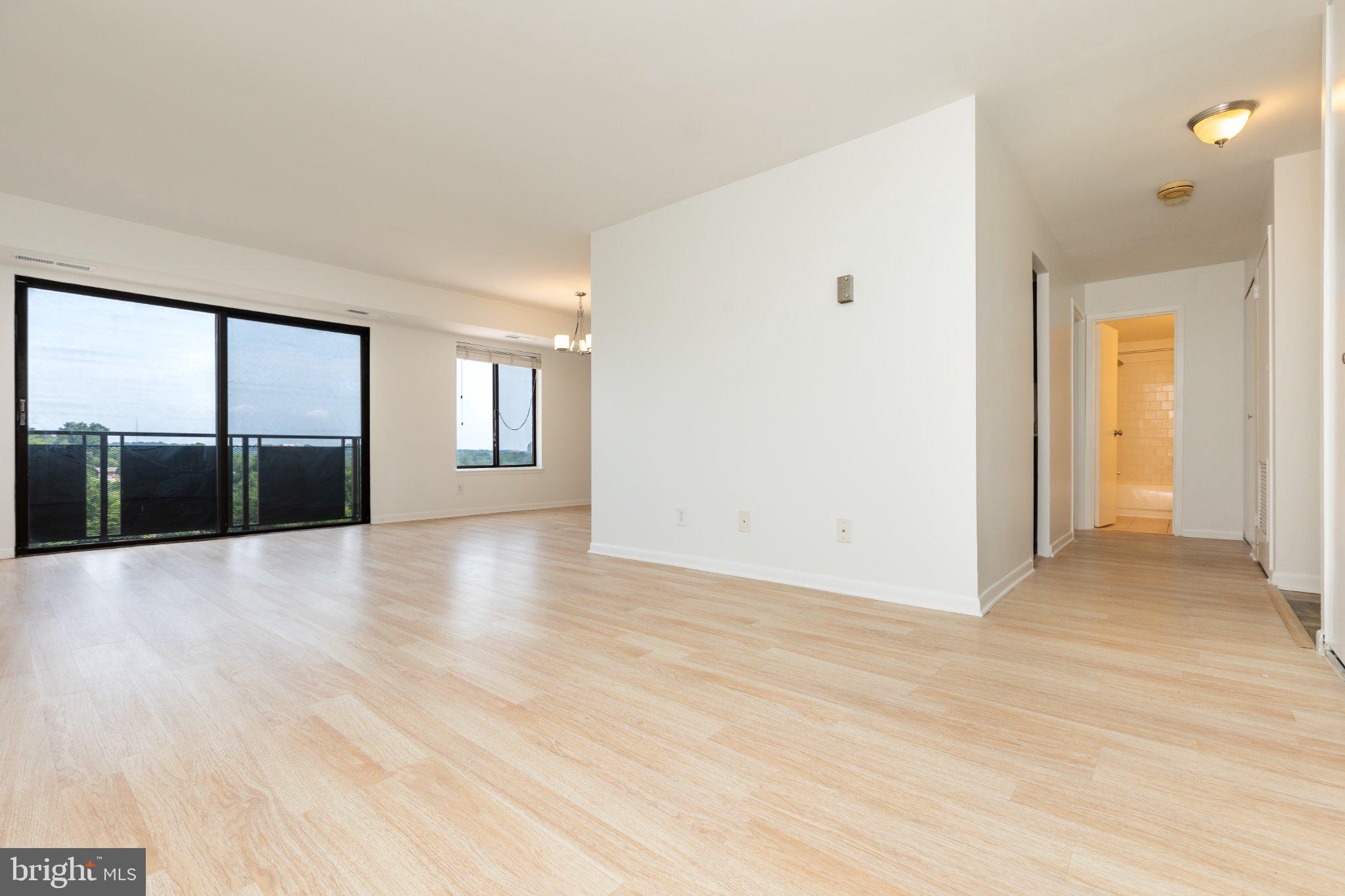 Welcome to effortless living in the desirable Woodlake Towers community! This beautifully updated TOP floor 1-bedroom, 1-bathroom condo offers the perfect blend of modern style, comfort, and convenience. Freshly painted throughout, the home features luxury vinyl plank flooring, a fully renovated bathroom, and a bright, inviting living space ready for you to move right in.

The kitchen features granite countertops and stainless steel appliances, offering a clean and functional space for everyday cooking and entertaining.

Step outside to your spacious private balcony on the top floor, the perfect spot to enjoy your morning coffee or unwind after a long day.

One of the biggest advantages of this home is that the condo fee includes all utilities, making monthly living simple and predictable. Laundry facilities are conveniently located on every floor.

Woodlake Towers offers an outstanding selection of resort-style amenities, including multiple swimming pools, a fitness center, tennis courts, a children's playground, beautifully landscaped picnic and gazebo areas, a party room, guest suites available for overnight visitors, and on-site convenience stores.

Ideally situated just minutes from Washington, DC, Arlington, major commuter routes, shopping, dining, and entertainment, this location is hard to beat. Metro stations are only 1 to 3 miles away, a bus stop is located directly in front of the building, and Ronald Reagan Washington National Airport is less than 10 miles away, providing exceptional convenience for commuters and travelers alike.

Whether you're a first-time homebuyer, downsizing, or looking for an excellent investment opportunity, this turnkey top-floor condo offers outstanding value in an unbeatable location.