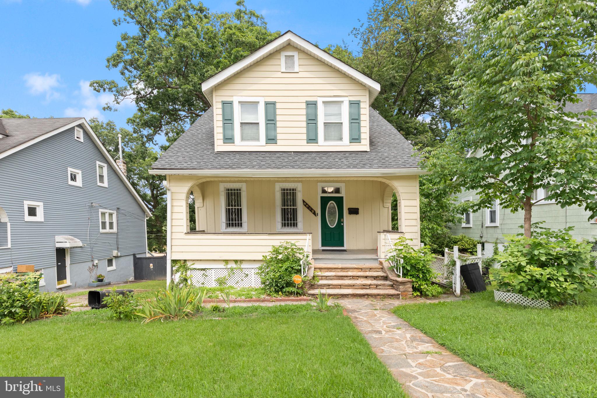 Welcome to this beautifully updated detached home where timeless charm meets modern comfort. From the inviting front porch to the rear deck, this home offers the perfect blend of character and functionality.

Inside, you’ll find sun-filled living spaces featuring hardwood floors, an open flow between the living and dining rooms, and a stylish kitchen complete with upgraded countertops, rich cabinetry, and ample prep space. A full bathroom on the main level adds convenience for guests and everyday living.

Upstairs, three generously sized bedrooms provide comfortable retreats, accompanied by a beautifully appointed full bath. The partially finished lower level offers flexible space for a family room, home office, gym, or additional storage.

Situated on a generous lot with off-street parking, this home also features a spacious backyard and rear deck—perfect for entertaining, relaxing, or enjoying warm summer evenings. Conveniently located near shopping, dining, parks, major commuter routes, and everything the Baltimore area has to offer, this move-in ready home is one you won’t want to miss!