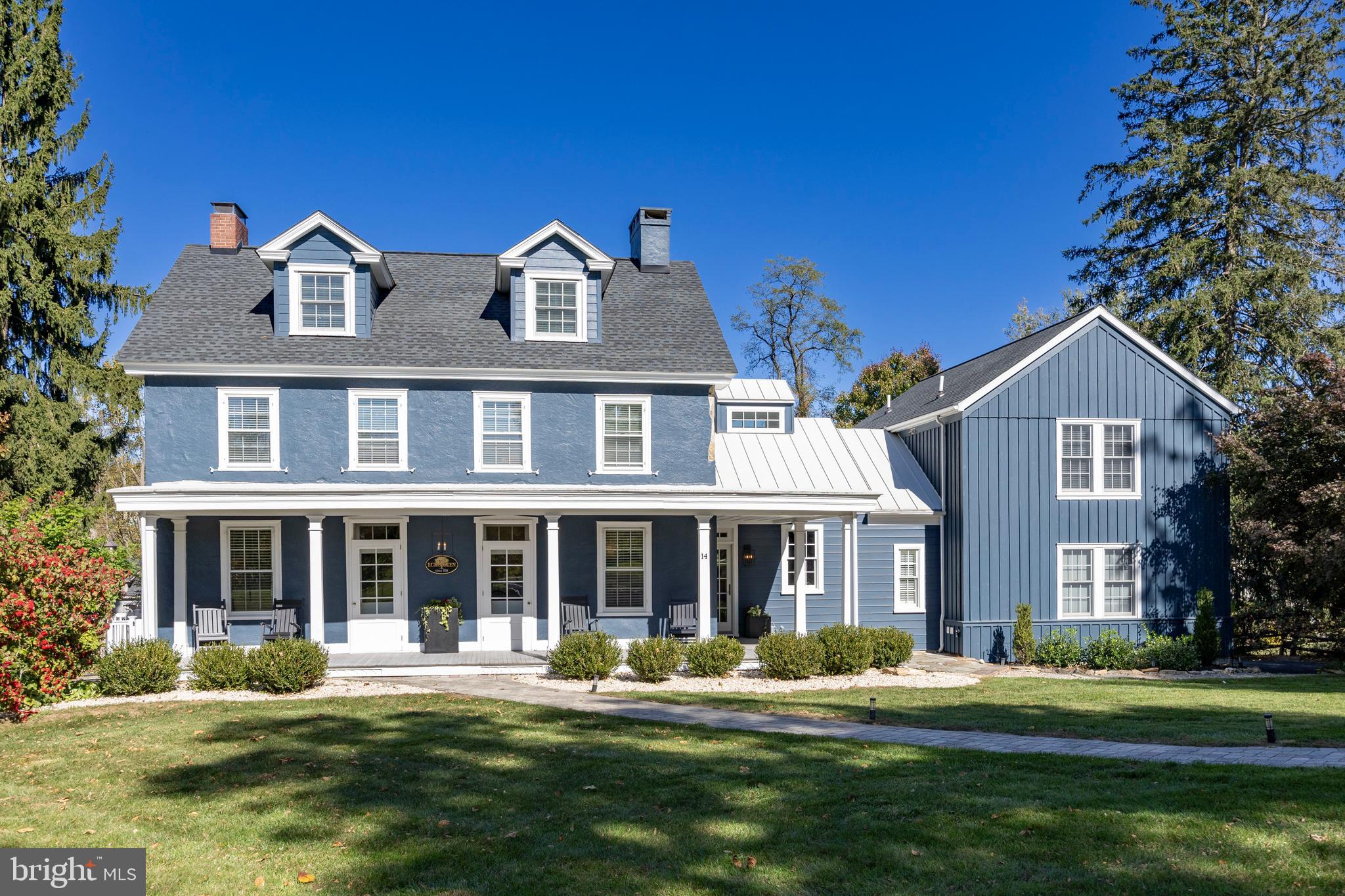 Nestled on two serene acres in East Brandywine Township, Echo Glen stands as a testament to over 300 years of history, charm, and craftsmanship. This exquisite Chester County farmhouse, dating back to 1724, seamlessly marries its rich historical roots with contemporary upgrades, making it an exceptional find for discerning buyers.
Historical Significance: Echo Glen is a captivating blend of the past and present. Its historic side boasts original exposed beams, a magnificent kitchen hearth, and preserved flooring and windows that whisper stories of yesteryears. The home features five spacious bedrooms and 3.5 baths, providing ample room for family and guests while maintaining an inviting atmosphere. Located in a quiet cul-de-sac, the property also enjoys the benefits of a highly rated Downingtown West school district.
Echo Glen has been beautifully renovated, merging contemporary elegance with its historic roots.
Stunning Kitchen
Custom Cabinetry: Timeless inset cabinetry with quartz countertops.
Red Oak Details: Soapstone-topped island and bespoke range hood.
Thermador Appliances: Induction cooktop, rotisserie oven, multifunction speed oven, and custom paneled fridge—$35,000 in premium appliances.
Kohler Farmhouse Sink: Enhanced by stylish faucets.
Scullery and Wet Bar: Perfect for entertaining, with custom cabinetry and wine fridge.
Radiant Heated Floors: Added warmth throughout the kitchen and scullery.
Spa-Like Primary Bath
Features radiant heated flooring, a stone slab shower, freestanding soaking tub, and double quartz vanity.
Additional Improvements
12 x 20 Rec Barn (2024) for leisure or storage.
New PVC Railing (2024) for outdoor safety.
Paver Stone Patio (2022) with a wood-burning fireplace.
Gravel Parking Pad (2022) for guest convenience.
Whole Home Water Softener (2021) for quality water.
Custom Wood Blinds (2021) for elegance.
Impressive Exterior
Includes a new roof and paint (2019) and a 20 x 30 red shed for storage.
Echo Glen isn’t just a home; it’s a lifestyle rich in history and modern comforts. Schedule a visit today and experience its timeless charm!