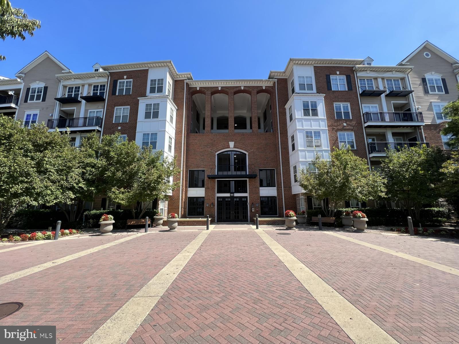 Gorgeous 1-bed 1-bath ground-level luxury condominium unit at The Fitz @ Rockville Town Center. Deluxe kitchen with plenty of counter and cabinet space and a breakfast bar. Open floor plan with 9-foot ceilings, vinyl plank flooring, a washer and dryer in the unit, and a balcony. A garage space comes with the unit. Convenience and ease of living make this condominium ideal for someone who works a lot or does not have a lot of time on their hands. The condominium building has plenty of amenities: community room with pool table and ping-pong table, fireplace and lounge area, kitchenette/bar area, 12-seat theatre room, gym, and swimming pool. Convenient to shopping, eateries, entertainment, and public transportation, including the Rockville Metro Station.