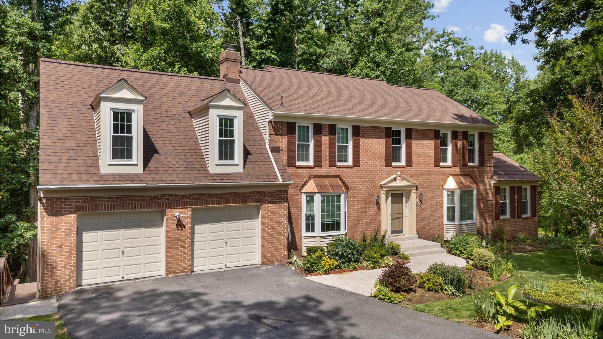 Welcome to 7142 Rivers Edge Rd — a stunning brick-front Colonial nestled in the highly sought-after Rivers Edge community in Columbia!

One of this home's biggest advantages is no HOA fees and no Columbia Association assessments, giving you more freedom and lower ownership costs.

Offering over 4,000 square feet of beautifully finished living space, this meticulously maintained, move-in-ready home combines timeless elegance with everyday functionality.

Step inside and be greeted by a dramatic spiral staircase that creates a grand first impression. The thoughtfully designed main level features a welcoming family room, an additional formal living room, a dedicated home office, bonus flex space, and an elegant formal dining room—perfect for entertaining, holidays, or working from home.

Freshly painted throughout, the upper level offers four generously sized bedrooms designed for comfortable family living.

The fully finished lower level provides exceptional flexibility with a full bathroom, kitchenette, and two spacious bonus rooms—ideal for an in-law suite, guest accommodations, a home gym, office, hobby space, or even potential rental opportunities.

Recent major updates include:

New roof
Brand-new windows
Fresh interior paint

Step outside to your own private retreat. The beautifully landscaped backyard backs to mature woods, providing exceptional privacy and a peaceful setting that's perfect for relaxing or entertaining family and friends.

Enjoy all that the area has to offer with nearby Holiday Hills Park, featuring a playground, basketball courts, and tennis courts. Outdoor enthusiasts will love being just minutes from Lake Elkhorn, Wilde Lake, Lake Kittamaqundi, and Centennial Lake, along with Columbia's extensive network of walking, running, and biking trails.

Commuters will appreciate the unbeatable location with convenient access to Washington, D.C., Baltimore, Annapolis, BWI Airport, NSA, NASA, MARC Rail, and major commuter routes.

Homes like this rarely become available. With its incredible space, thoughtful updates, private wooded setting, and exceptional location, 7142 Rivers Edge Rd offers the perfect blend of luxury, comfort, and convenience.

Schedule your private showing today and experience everything this exceptional home has to offer.