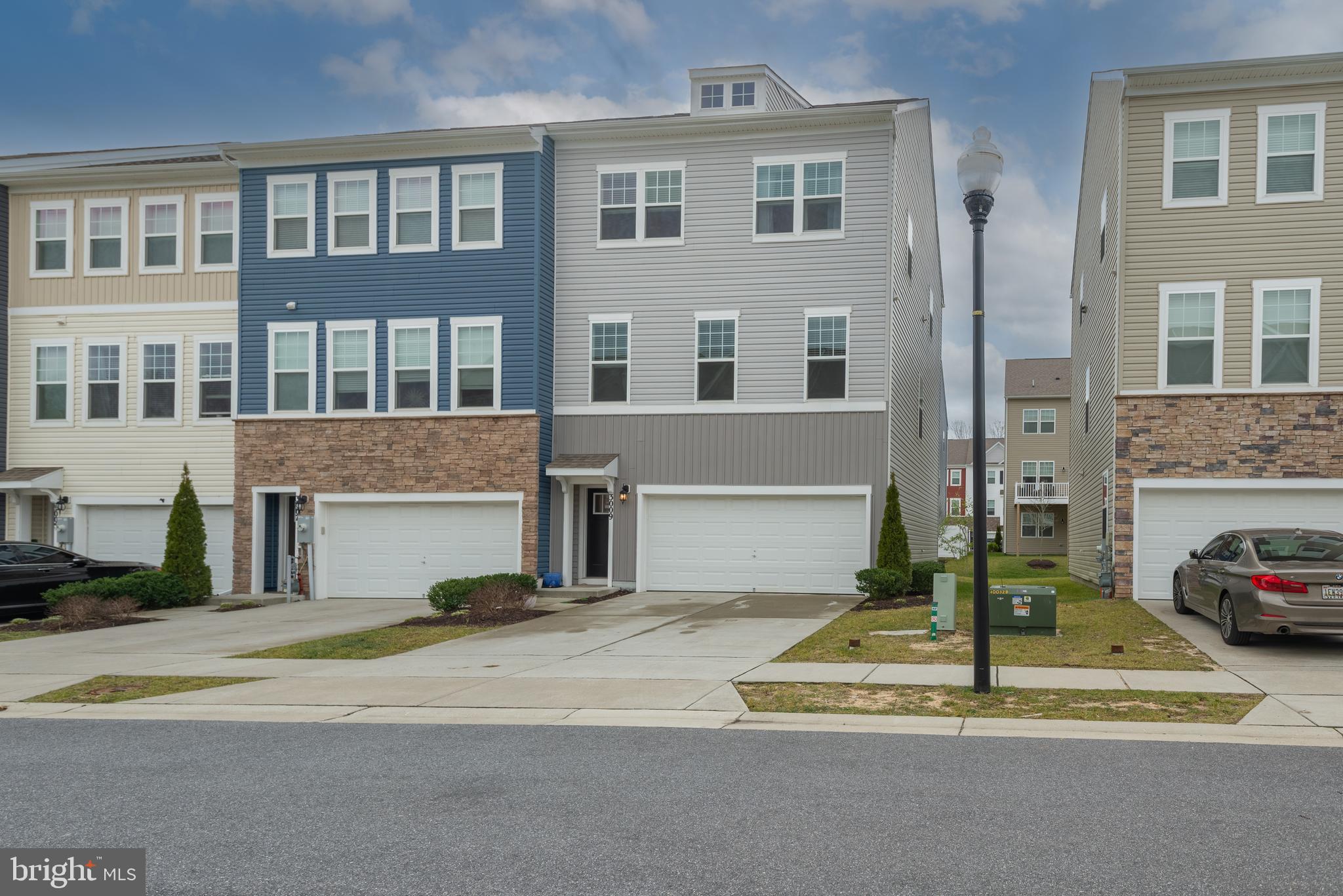 Don't miss out this beautiful end unit townhouse located in Parkside Community, Hanover. Built in 2019 by D.R. Horton. Fully finished on 3 levels with 2 car garage. Hardwood floor throughout the main floor.  Gourmet kitchen with granite countertop and stainless Steel Appliances. 3 beds/2 full bath upstairs with upgrade carpet . Walk out basement/garage access door/sitting bench. Convenient location !