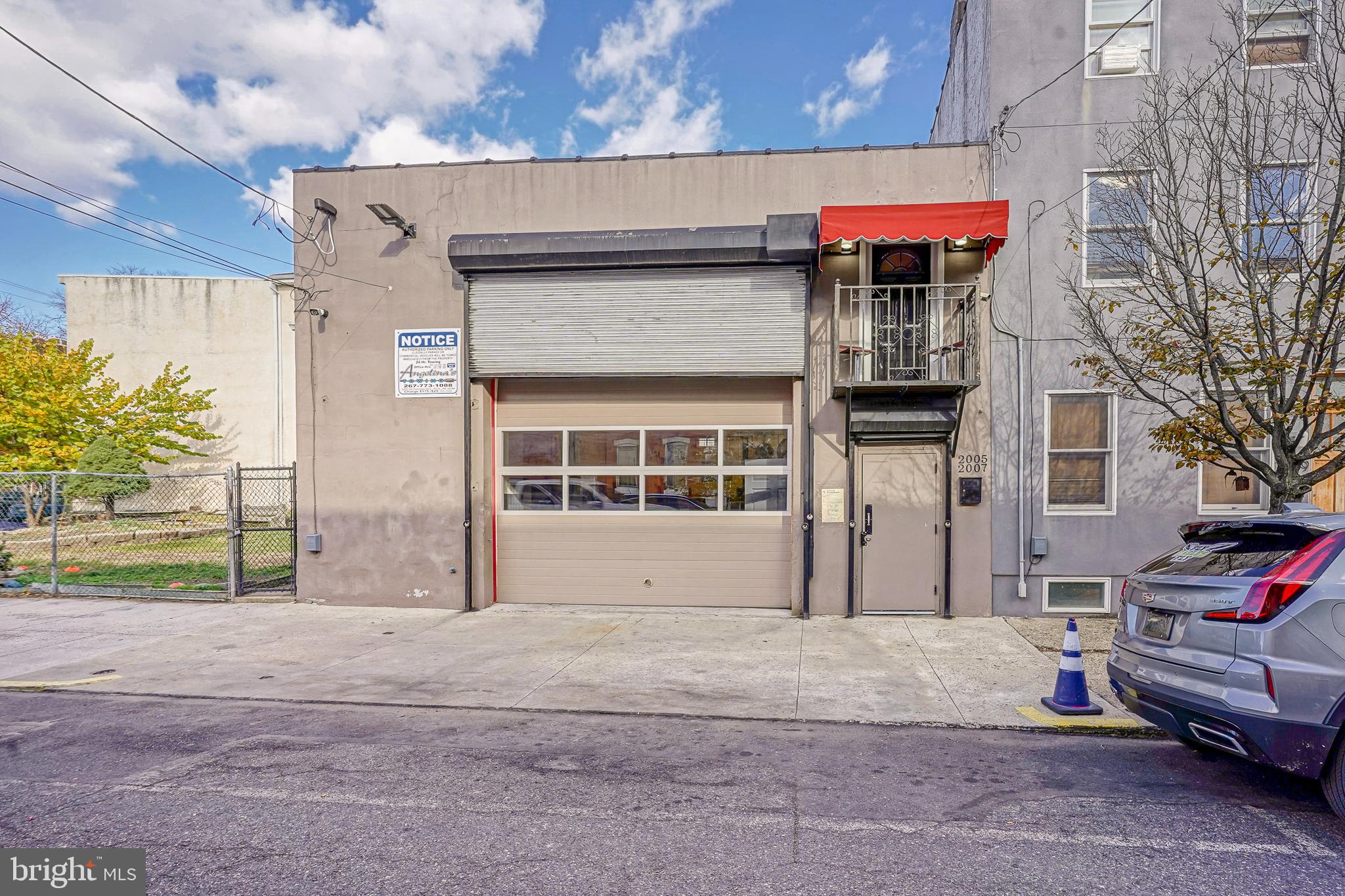 NEW PRICE!  Unique opportunity in the heart of Fishtown / East Kensington! Oversized garage with space for up to 12 vehicles, plus office and greeting area on the main level. Second floor features a private studio apartment with full bath and balcony access. Recently approved by the City of Philadelphia for a 3-year STORAGE VARIANCE. RSA-5 zoning. Buyer responsible for confirming all intended uses, zoning, and any additional variances with the City of Philadelphia.