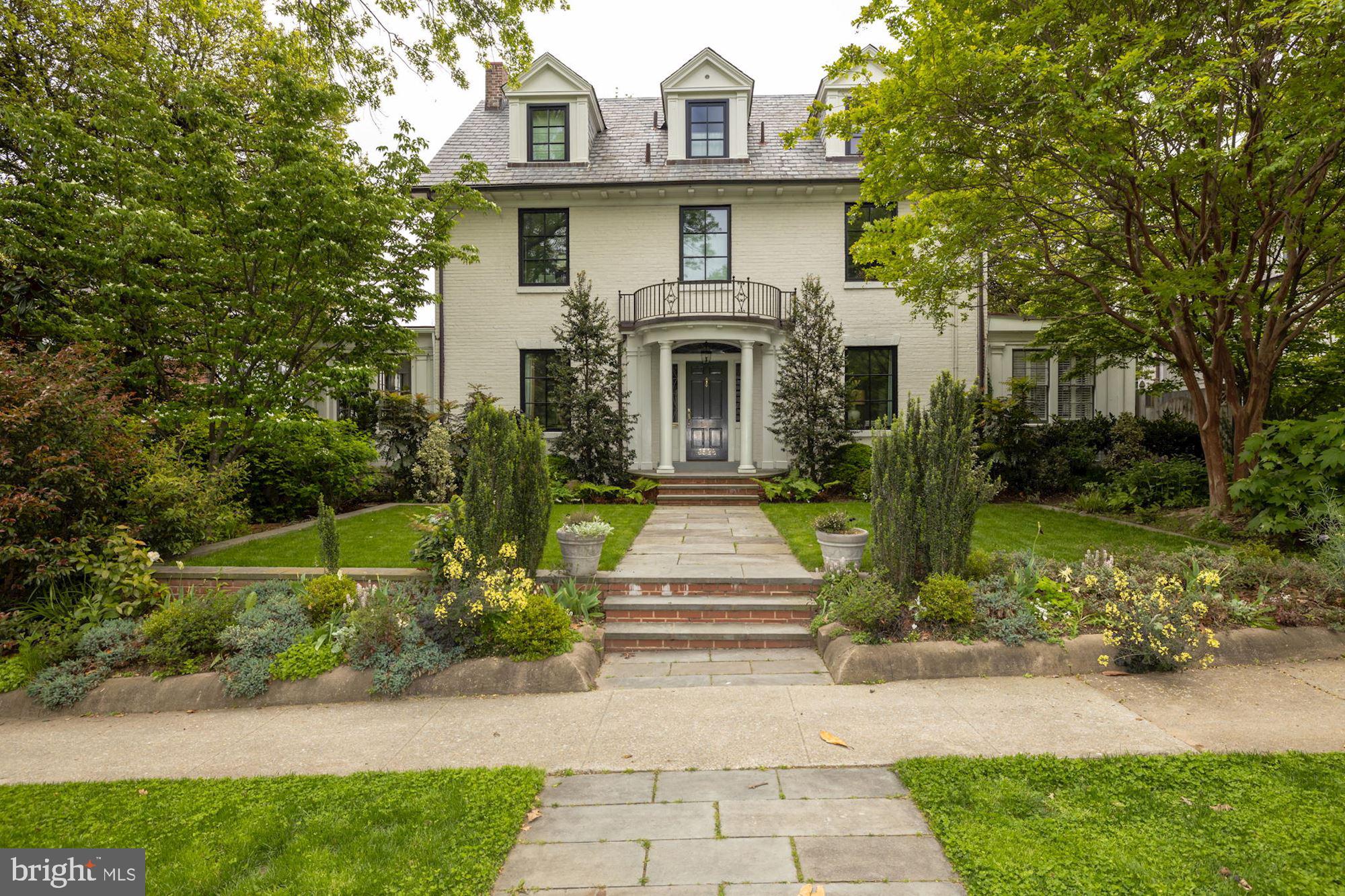 CANCELLED OPEN HOUSE - PROPERTY UNDER CONTRACT.  

WONDERFUL NEW LISTING Lovely, large and light-filled, 1924 expanded colonial in sought-after Observatory Circle with prominent street presence, beautiful professional landscaping front & back (south -facing rear) and amazing spaces inside.   Large lot of 8625 sf.  Grand entrance hall with graceful stair to 3rd floor with two windowed landings; tall ceilings, grand windows ( most very recently replaced), recessed lighting, crown moldings, beautiful hardwood floors & two fireplaces.  The GORGEOUS LARGE 2018 kitchen with large informal eating area (or sitting area) opens to the rear terrace and deck  through floor to ceiling steel and glass doors.  The center hall, living room, and family room also open to the rear--all on grade. 5 large bedrooms and 3 baths up; lower level mud room (see floor plan) with separate entrance is  Bedroom 6 option for an au pair/in-law bedroom with the simple addition of a door.  There is adjacent full bath.  Many  recent  infrastructure upgrades and improvements including roof, fireplace, AC, irrigation system and more have been made.  Large detached garage is 20x18- so two small cars or one large one+.