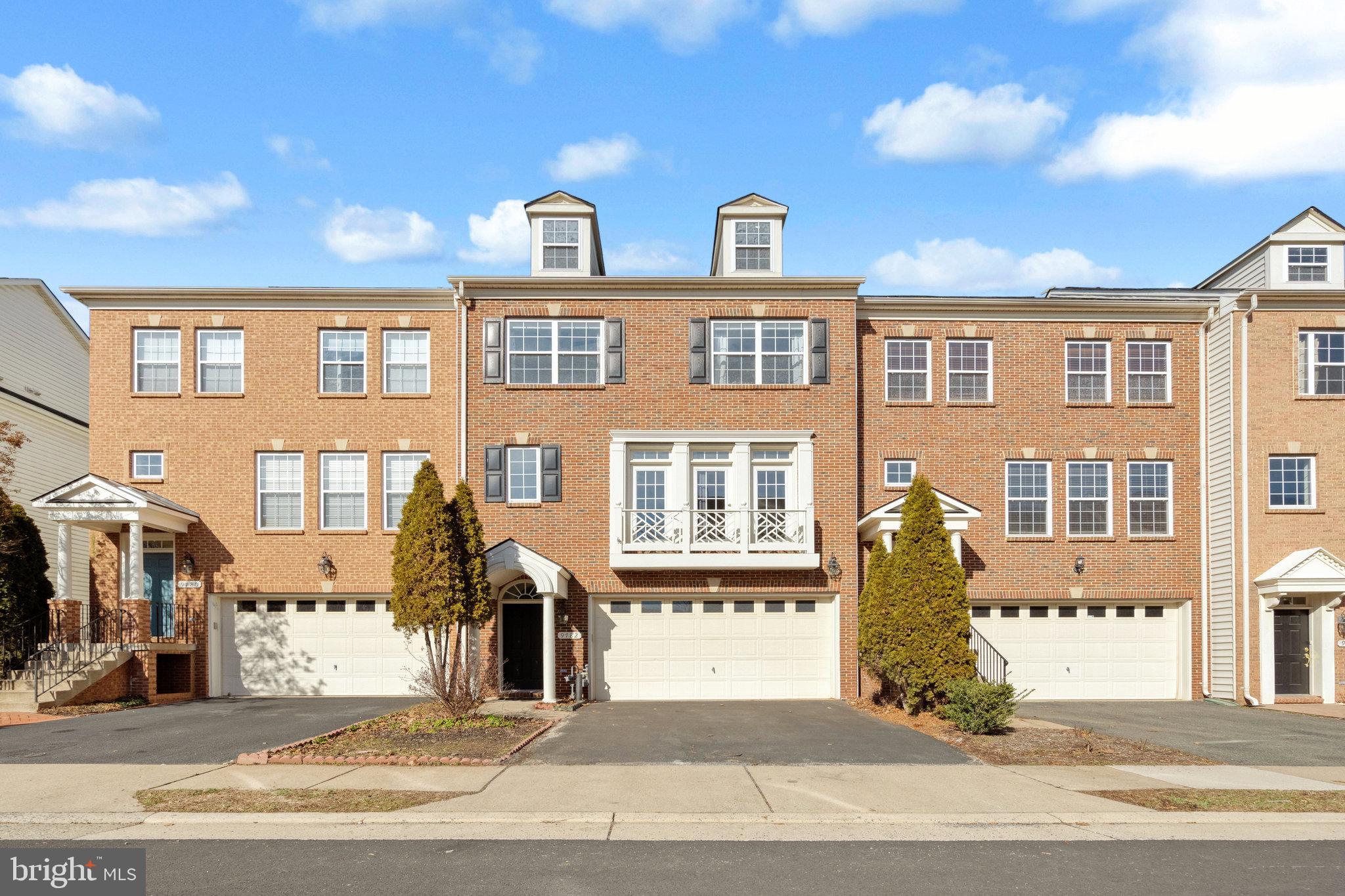 Rarely available stunning Townhome in Manassas Park Station.  Home Features  3 Bed, 3 Full Bath,  1 Half bath, 2 Car Garage, Large Living Area, Gourmet kitchen , fully finished basement and nice backyard. Excellent location just Minutes to VRE, Shopping, Restaurants, 28, and I-66.
Upon Entering the home, step up to Huge Gourmet Kitchen, Wood Floors, 5 Burner Cooktop, Wall Oven With Microwave . Large Living/Dining Room Combination With Hardwood Flooring. Relaxing Primary Bedroom With Tray Ceiling, and Walk-in Closet. Primary Bath Has Separate Soaking Tub and Shower. 2 Additional Nice Sized Bedrooms, Full Bath, and Bedroom Level Laundry With Front Loading Washer and Dryer completes The Upper Level. Lower Level Has a Recreation Room With fireplace wood flooring and Full Bath. Walk-Out To Back Yard. Community boasts a lot of amenities such pool, tot lot and waking trails.