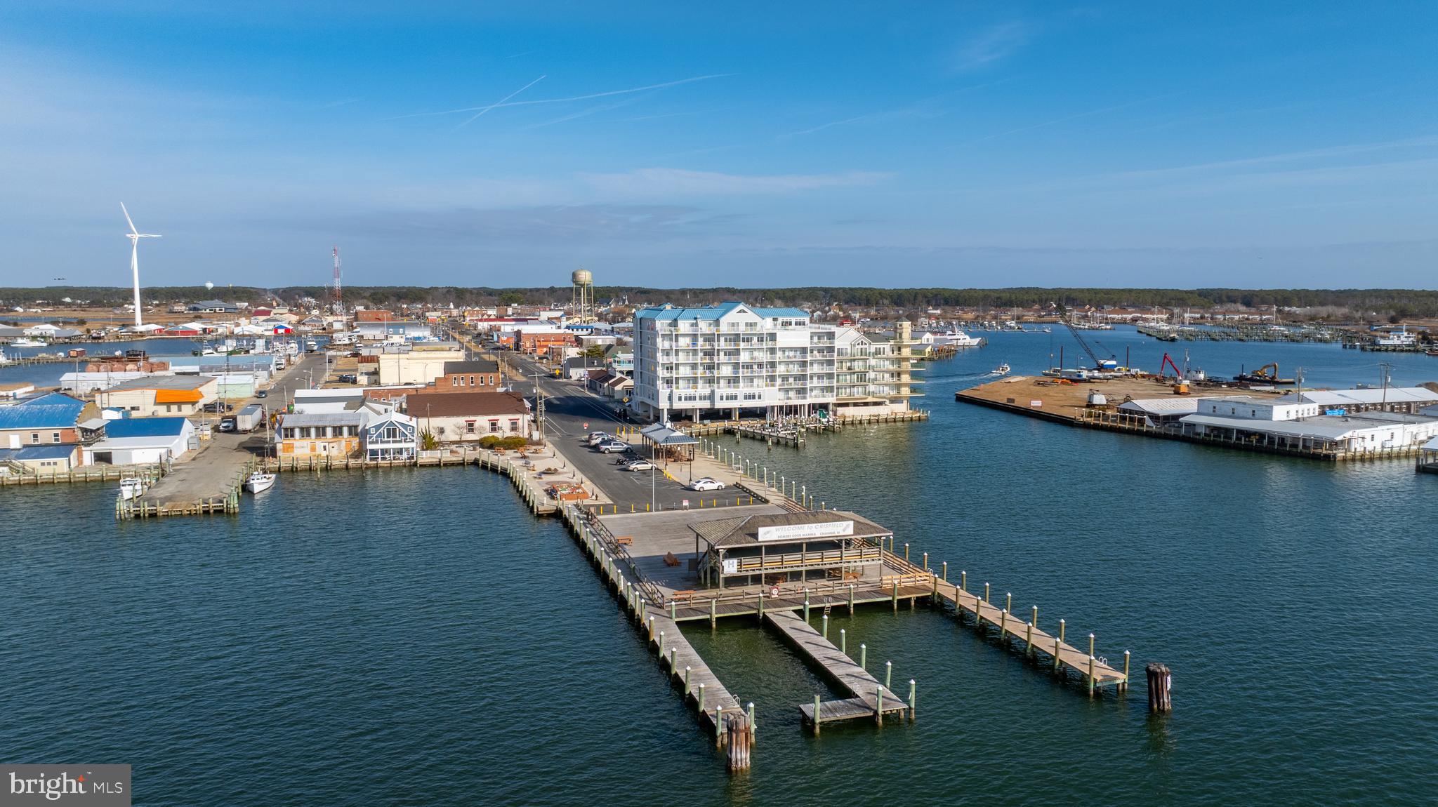 3 bedroom/ 3 Full Bath condo In Captains Galley Condominiums in Crisfield Maryland. Owners suite overlooks City Dock and the Tangier Sound. At almost 1900 sf, this condo offers an open concept and sizeable bedrooms. Home has been meticulously maintained with recent paint and flooring just completed! Captains Galley offers a roof-top pool and exercise room! Just a few feet from Somers Cove Marina for the boating enthusiast! Just a few hours from the DC and Baltimore Metro areas and 1 hour to Ocean City and other area attractions. Unit comes Furnished!