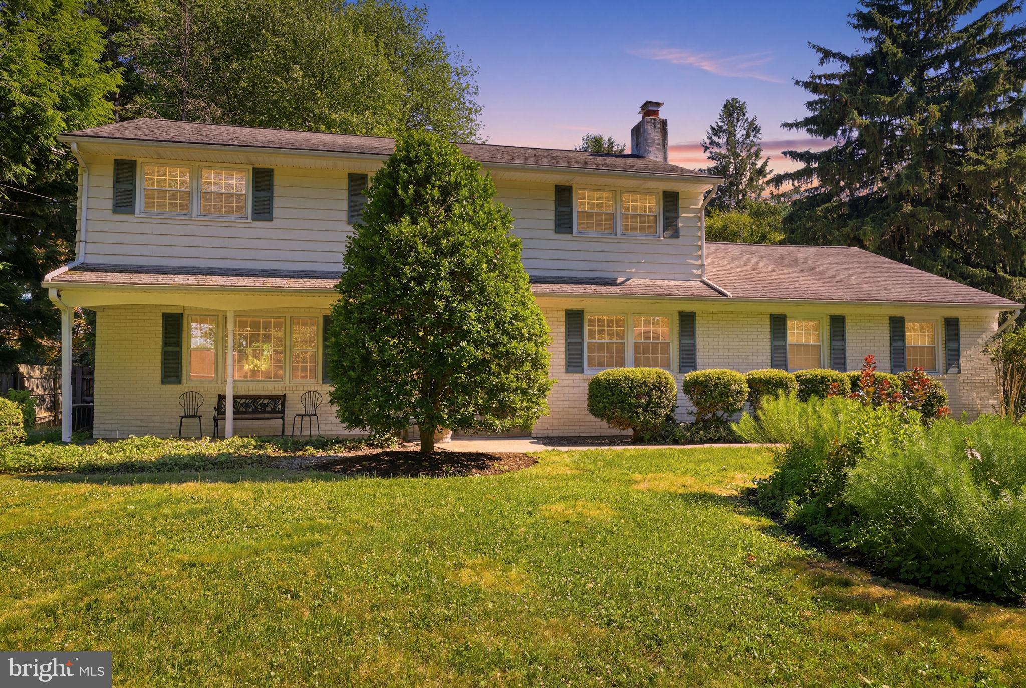 Welcome to 949 Queens Drive, a beautifully maintained 4-bedroom, 2.5-bath home nestled in the desirable Edgewood Park neighborhood and award-winning Pennsbury School District. Offering over 2,600 square feet of living space, this home combines timeless character, thoughtful features, and exceptional outdoor living. Recent improvements include fresh paint throughout most of the first floor and new flooring in the laundry/mudroom, allowing the next owner to move right in and enjoy.  A professionally designed landscape creates outstanding curb appeal and leads to a charming covered front porch. Inside, you'll find spacious and comfortable living areas filled with natural light. The formal living room features crown molding (as does the dining room) a large picture window that beautifully frames the front yard, while the dining room is highlighted by an impressive bay window, creating an inviting setting for gatherings and everyday meals. Hardwood flooring lies beneath the carpeting throughout the home, offering exciting potential for future enhancement.  The warm and inviting family room features a cozy brick-surround gas fireplace, custom built-in shelving, and cabinetry. The adjacent kitchen offers a pleasant view of the backyard from the sink, allowing you to enjoy the beauty of the outdoor space while preparing meals or tackling daily tasks. A generously sized first-floor laundry and mudroom provides exceptional functionality, additional storage, and convenient access to the garage.  Upstairs, the primary suite offers a private retreat complete with a walk-in closet and en-suite bath. Three additional bedrooms and a full hall bath provide ample space for family, guests, or a home office. All bedrooms feature generous closet space, ensuring plenty of room for storage and organization.  The partially finished basement expands the home's usable living space and offers flexibility for recreation, hobbies, fitness, or storage. Additional features include a whole-house generator for added peace of mind and a spacious two-car side-entry garage.  Step outside to enjoy a truly special backyard retreat. Professionally designed landscaping surrounds a private outdoor setting highlighted by a 15' x 17' three-season enclosed patio room. Featuring two skylights and a ceiling fan, this versatile space serves as an extension of the home's living area and is ideal for everyday living, dining, entertaining, or simply relaxing in comfort. Enjoy the sights and sounds of the outdoors while remaining protected from insects, making it the perfect place to savor meals, host gatherings, or unwind throughout the spring, summer, and fall seasons. Beyond the patio room, the beautifully landscaped backyard provides privacy and year-round enjoyment.  Ideally located in one of Yardley's most established neighborhoods, this home offers the perfect combination of space, comfort, and convenience. The Yardley Train Station is just a five-minute drive away, providing easy commuting options. You'll also enjoy being less than two miles from the charming shops, restaurants, and amenities of Yardley Borough, with nearby access to I-295 for convenient travel to Philadelphia, New Jersey, and beyond. This is a wonderful opportunity to enjoy a beautifully cared-for home in a highly sought-after community.