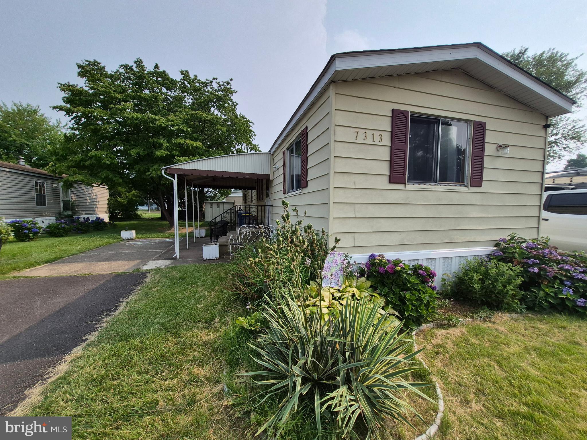 Welcome to 7313 Hansbury in Morrisville! This spacious two-bedroom, two-bath mobile home offers comfortable, convenient one-level living. The spacious layout features a bright living area, an inviting updated kitchen with ample cabinet and counter space, and a dedicated dining area ideal for everyday meals or entertaining. The primary bedroom includes a private full bathroom, while the second bedroom and additional full bath provide flexibility for guests, a home office, or additional living space. Enjoy low-maintenance living with convenient access to shopping, dining, major roadways, and nearby community amenities. This home is a great opportunity for buyers looking to downsize, purchase an affordable primary residence, or enjoy easy single-floor living. Schedule your showing today!