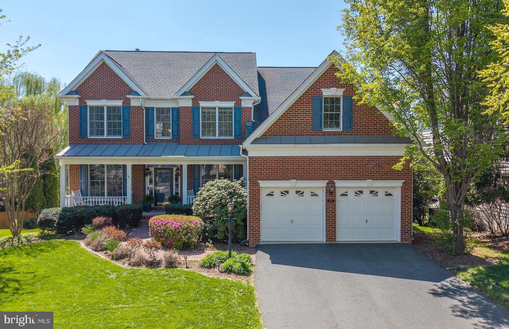 One-of-a-Kind Brick-Front Ellsworth Extended in Sought-After DVCC!
Stunning 6BR/4.5BA home offering approx. 5,400 sq ft of thoughtfully designed living space in a resort-style community! Built for multigenerational living, this home features a rare main-level en-suite bedroom with private garage entrance—ideal for guests, in-laws, or au pair.
Enjoy an inviting double front porch, formal Living Room, separate Dining Room with elegant shadow boxes, and a gourmet Kitchen with granite counters, center island, SS appliances, built-in microwave, and double wall oven. Sunroom addition leads to a spacious, maintenance-free deck overlooking a fully fenced backyard with mature landscaping.
The expanded two-story Family Room is flooded with natural light and features a dramatic floor-to-ceiling stone gas fireplace, custom drapes, and a designer chandelier. Home Office with bay window, refinished hardwood floors on main level, staircase, and upper hallway, and a renovated walk-in Laundry Room.
Owner’s Suite boasts a cathedral ceiling, large custom walk-in closet, and versatile bonus space—perfect as a sitting area, gym, or 2nd office. Luxurious Owner’s Bath includes a corner soaking tub and separate shower. Three additional well-sized bedrooms and a hall bath complete the upper level.
Recently finished walk-out basement features a spacious Rec Room, full bath, wine cellar, Bedroom #6, bonus room, and a stylish kitchenette with quartz countertops. Paver patio under the deck extends your outdoor living space.
Major Updates: Roof (2017), Driveway repaved (2019).
Resort-style amenities include: Arnold Palmer Signature Golf Course, renovated Clubhouse, Sports Pavilion, 5 pools (incl. indoor), tennis & basketball courts, playgrounds, trails, and fishing ponds.
Award-winning schools!