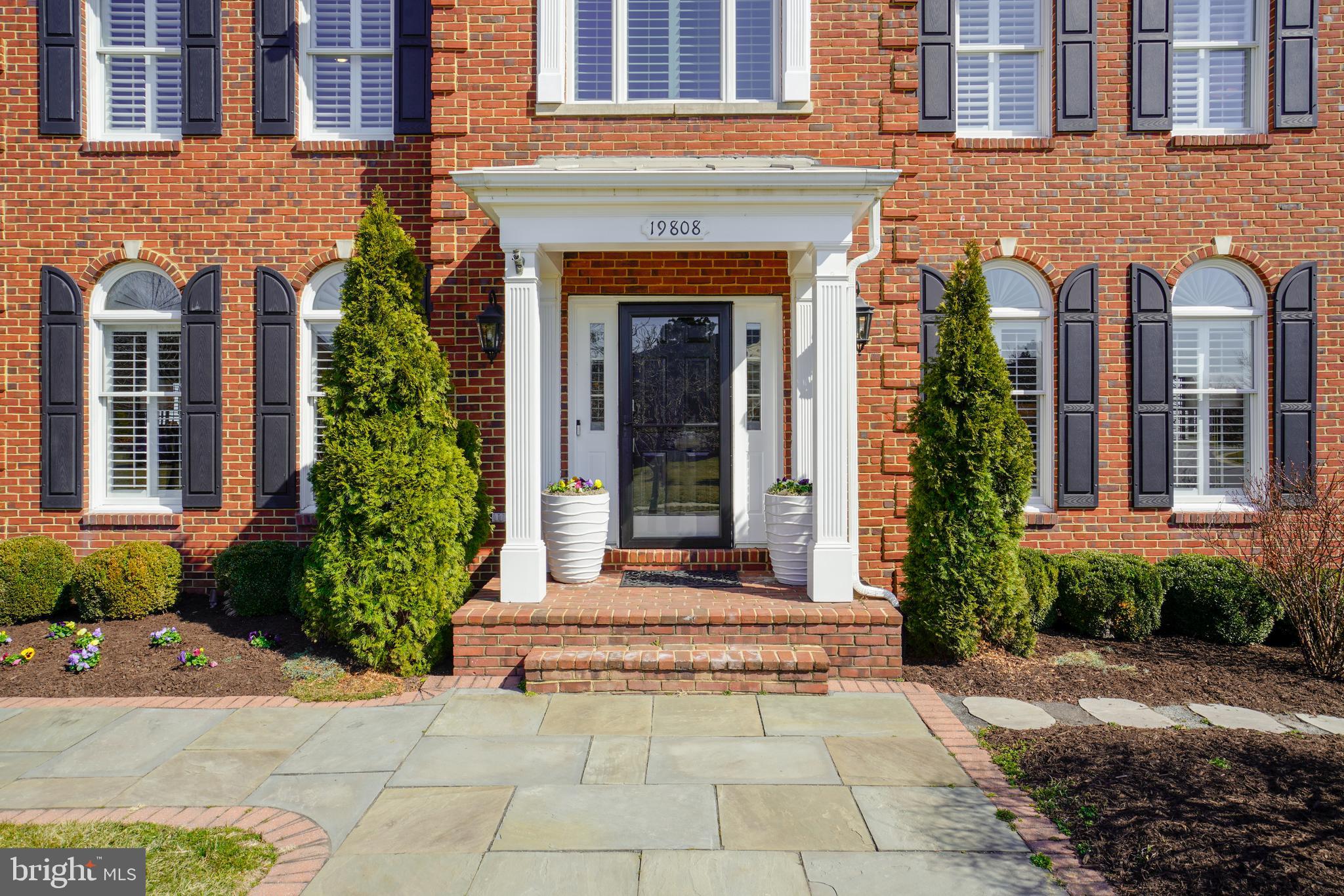 WOW  this BEST BUY in BELMONTCC is now available to tour.   Get Ready to Fall in Love with the home you have always wanted. Beautifully appointed, 7 bedrooms/7.5 full baths, approx 8,100+ total sq feet of living space to enjoy..... LOOK NO FURTHER... The Toll Brothers Belmont Country Club Community HAS IT ALL to meet your family lifestyle & needs.... Great location, amenities and LAWN & LANDSCAPE MAINTENANCE covered by the HOA.... No more mowing to worry about.... The Chesapeake Extended floorplan is perfect for a multigenerational home, 4 sides brick, 3 car garage, sited on a premium lot overlooking the 10th Fairway. The minute you enter this home, you know you have arrived and are about to fall in love with ALL this home has to offer...   ON EVERY LEVEL Plantation shutters, an open floor plan to enjoy, an abundance of natural sunlight, exquisite crystal chandeliers, sconces & ceiling lights,  Surround Sound Speakers, ALL BATHS have been updated. MAIN LEVEL hardwoods are featured throughout, 2 gas fireplaces, a spacious office for working from home, Separate Dining, Living, Family, and Sun Rooms, 1 bedroom (currently used for a virtual classroom) and ensuite bath, powder room, laundry room, gourmet kitchen features stainless appliances, Thermador Professional 6 burner gas stove, tons of cabinetry, huge island and counter space.  easy access to the composite deck w/rail lighting, watering system for your plants (such a great idea) and gas grill connection. UPPER LEVEL you will find a beautiful Master Retreat & Spa Bath (wait until you see it) and 3 Spacious Bedrooms & 3 ensuite updated baths. FINISHED LOWER LEVEL enjoyed by all ..... hardwoods, fun recreation room for a variety of games (pool or ping pong), second kitchen, media room to watch your favorite movies, 2 Spacious Bedrooms & 2 ensuite updated baths.  One of the bedrooms is currently being used as a Work Out Room and the other is being used as a Music Room.  SOOOOO much space offers SOOOOOO much flexibility..... use the rooms however they will work for you...... need an in-law or an au pair suite this is the home for you.... LOWER LEVEL OUTDOOR LIVING features a SWIM SPA and adjoining patio...... the VIEWS are incredible, and relaxing on any level....you will never want to leave.... Check out the walking tour https://player.vimeo.com/video/522269828