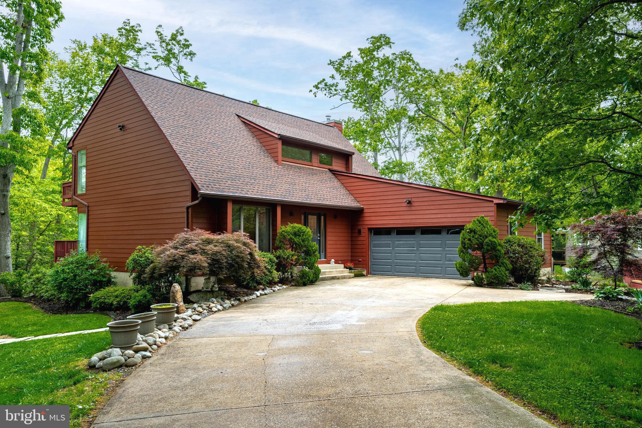 771 Macsherry Drive — A private waterfront retreat on the Broadneck Peninsula — built for multigenerational living, committed watermen, and those who simply refuse to settle for ordinary.
With 4 bedrooms, 3.5 baths, and sweeping panoramic views of open water and woodland, this home is a lifestyle compound designed around everything that makes life on the Bay extraordinary.

Made for the Water....
Your private dock is ready from day one-- updated with water, electric and new decking (2023), and fully equipped for sizable boats, kayaks, & more. Spend mornings on the water and your evenings on your expansive deck, one of two private balconies, or from the brand-new hot tub in your separate waterfront cottage (2023). Whether you're running out to the Bay for a morning fishing trip or trailering back from a weekend regatta, this home is built around the rhythm of the water.

Built for Multigenerational Living....
This home truly delivers on the promise of flexible, multigenerational living. The fully renovated in-law suite (2021) features its own private entrance, full kitchen & bath, and separate laundry — giving extended family, adult children, or long-term guests complete independence and privacy without ever leaving the property. Not just a bonus room — it's a genuine second home under the same roof, with waterfront views to match. Upstairs, the stunning primary suite offers a true sanctuary: oversized closets, private balcony access overlooking the water, and a spa-inspired luxury bath with an expansive walk-in shower, fully renovated in (2025). Two additional bedrooms round out the upper level, all positioned to capture the water views. 

Ready for Anything and Built to Last...
The updates here go beyond cosmetic.  The HardiPlank siding (2024) means this home stands up to tough weather while being low maintenance. And a 17kW Generac generator offers peace when a storm rolls in. Two new EV chargers (2023) mean you're ready to roll with full range.  An updated water heater (2022) and updated HVAC (2023) offer mechanical sturdiness for years to come. 

Nestled on the Broadneck Peninsula....
This is one of the most accessible waterfront corridors in the region — minutes from the Chesapeake Bay, Sandy Point State Park, and the bridges and waterways that connect you to the best cruising, fishing, and sailing the mid-Atlantic has to offer.  As an additional bonus, your minutes from tasteful dining, shopping, commuter routes, and more. And when you don't feel like driving, it's all connected to access on foot or on bike via the Broadneck Trail. And when you're looking for a little more than what's in town, Annapolis is minutes away!

Entertain a Crowd...
The main living level was designed with gatherings in mind. Hardwood floors and modern, oversized windows flood the home with natural light and frame the water at every turn. A flowing open floorplan connects the family room, morning room, living room, and dining room around a modern central kitchen — effortlessly moving from an intimate family dinner to a full Chesapeake crab feast for a crowd.
Outside, the expansive decks and dual balconies give you the square footage to host at scale. Fire up the grill for a waterfront BBQ, string up a hammock for an afternoon nap, or gather the whole crew on the dock for a sunset cruise send-off. The separate cottage with hot tub is the perfect finishing touch — your personal retreat when the guests have finally gone home.

Waterfront properties of this caliber are rare.  Come capture the spirit of the water AND the coziness of home at 771 Macsherry Drive!