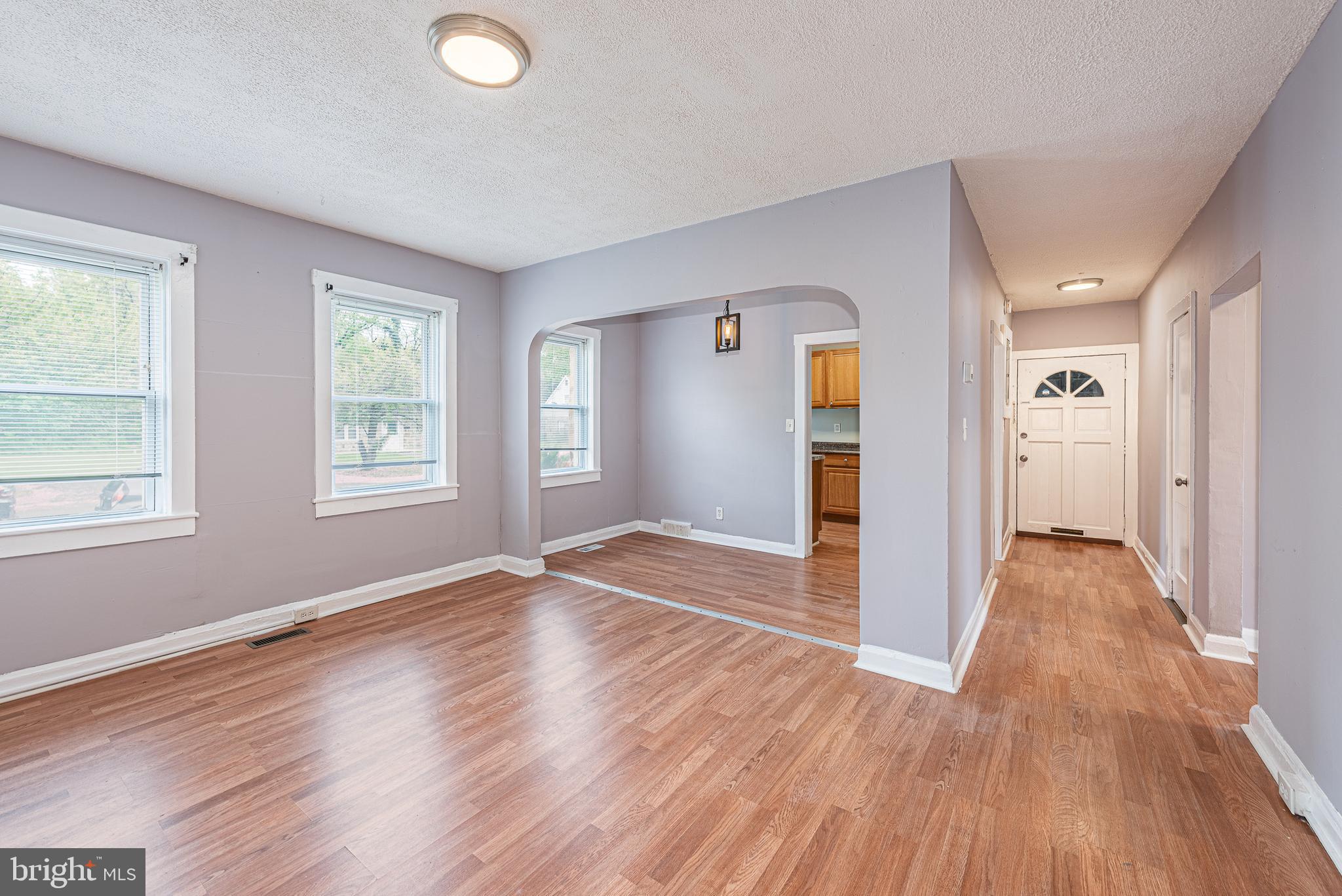 SPACIOUS UPDATED 2 BEDROOM 1 BATH APARTMENT! This unit is located in an 8 unit building and features all wood floors, spacious living room, separate dining area, galley kitchen, 2 large bedrooms, 1 full bath, and in unit laundry. Located steps from Bengie's drive through, shopping, and restaurants!  Must have good credit to be considered
