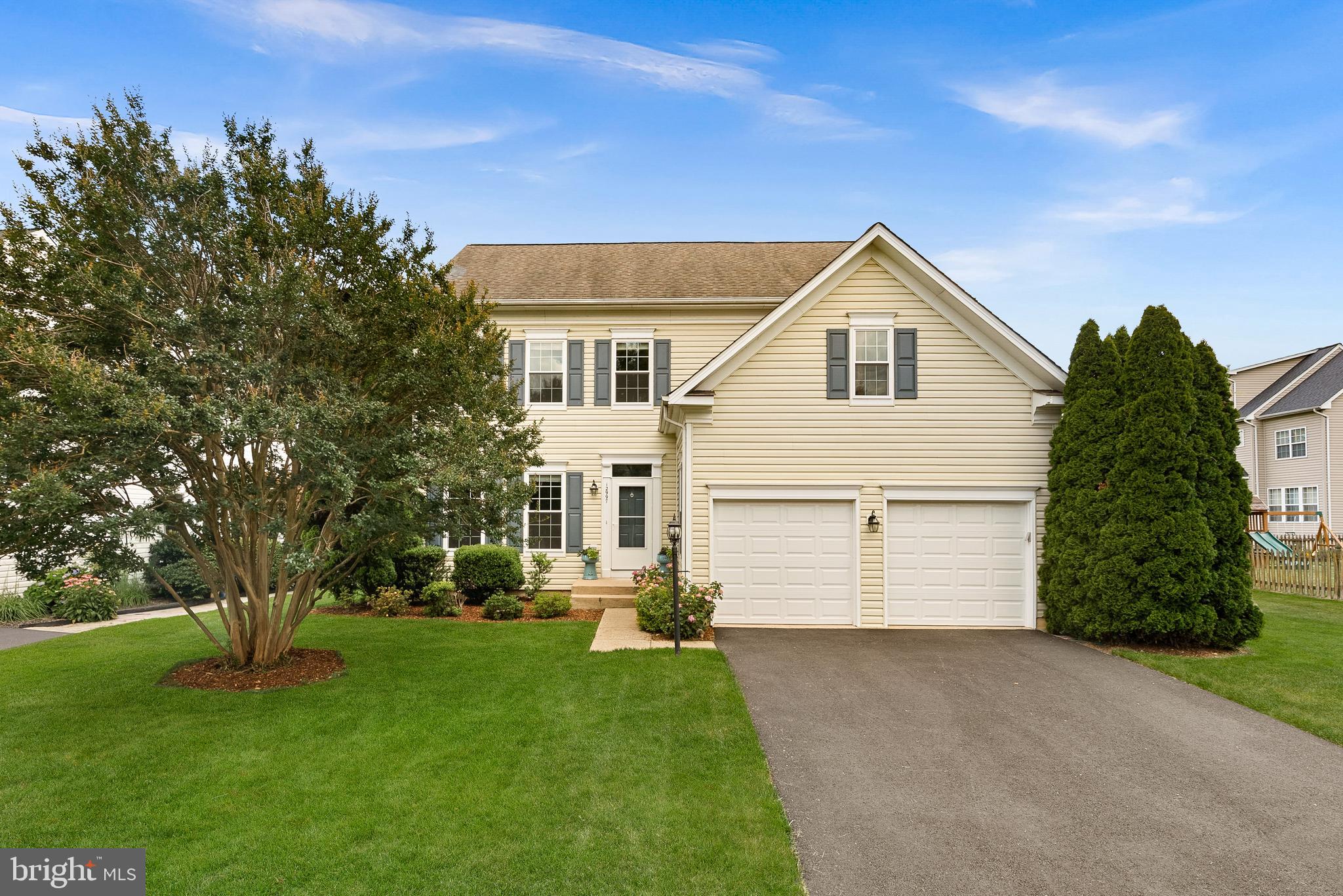 Welcome home to this beautifully updated Yardley model by Brookfield nestled in one of Bristow's most sought-after communities. Offering more than 3,300 finished square feet on three finished levels, this impressive residence combines generous living spaces, modern updates, and exceptional outdoor entertaining. The main level features luxury vinyl plank flooring, spacious formal and casual living areas, and a striking family room anchored by a beautifully updated fireplace with a quartz surround. The renovated kitchen is sure to impress with refinished cabinetry, quartz countertops, designer tile backsplash, stainless steel appliances, updated fixtures, and abundant workspace for everyday living and entertaining. The family room and kitchen are bumped out for additional space. Upstairs, you'll find three spacious bedrooms, including a relaxing primary suite, along with updated bathrooms featuring new tile flooring. The finished lower level adds incredible flexibility with a large recreation room, fourth bedroom option, full bath, and plenty of storage—ideal for guests, multi-generational living, or a private home office. Step outside and enjoy the expansive Trex deck, perfect for summer barbecues, morning coffee, or evening gatherings overlooking the backyard. Extensively updated and meticulously maintained, major improvements include: • Refinished kitchen cabinets (2026) • New garage door opener motors (2026) • Lighting fixtures (2026) • New stair carpeting (2026) • Smoke detectors (2025) • Stainless steel kitchen appliances (2025) • Finished lower level with recreation room, bedroom, and full bath (2024) • Garage doors (2024) • Luxury vinyl plank flooring throughout all three levels (2023-2024) • Quartz fireplace surround (2023) • Kitchen backsplash (2023) - Kitchen Sink and Garbage Disposal (2023) • Tile flooring in upper-level bathrooms (2023) • Quartz kitchen countertops (2022) • Most windows replaced (2021) • Water heater (2019) • Trex deck (2016) • 30-year architectural roof (2015) • HVAC system (2013) As an added bonus, Verizon FiOS service is included in the HOA dues, providing exceptional value and convenience. This move-in ready home offers the perfect combination of space, updates, and location. Don't miss your opportunity to make 12997 Kyle Moor Place your next home.
