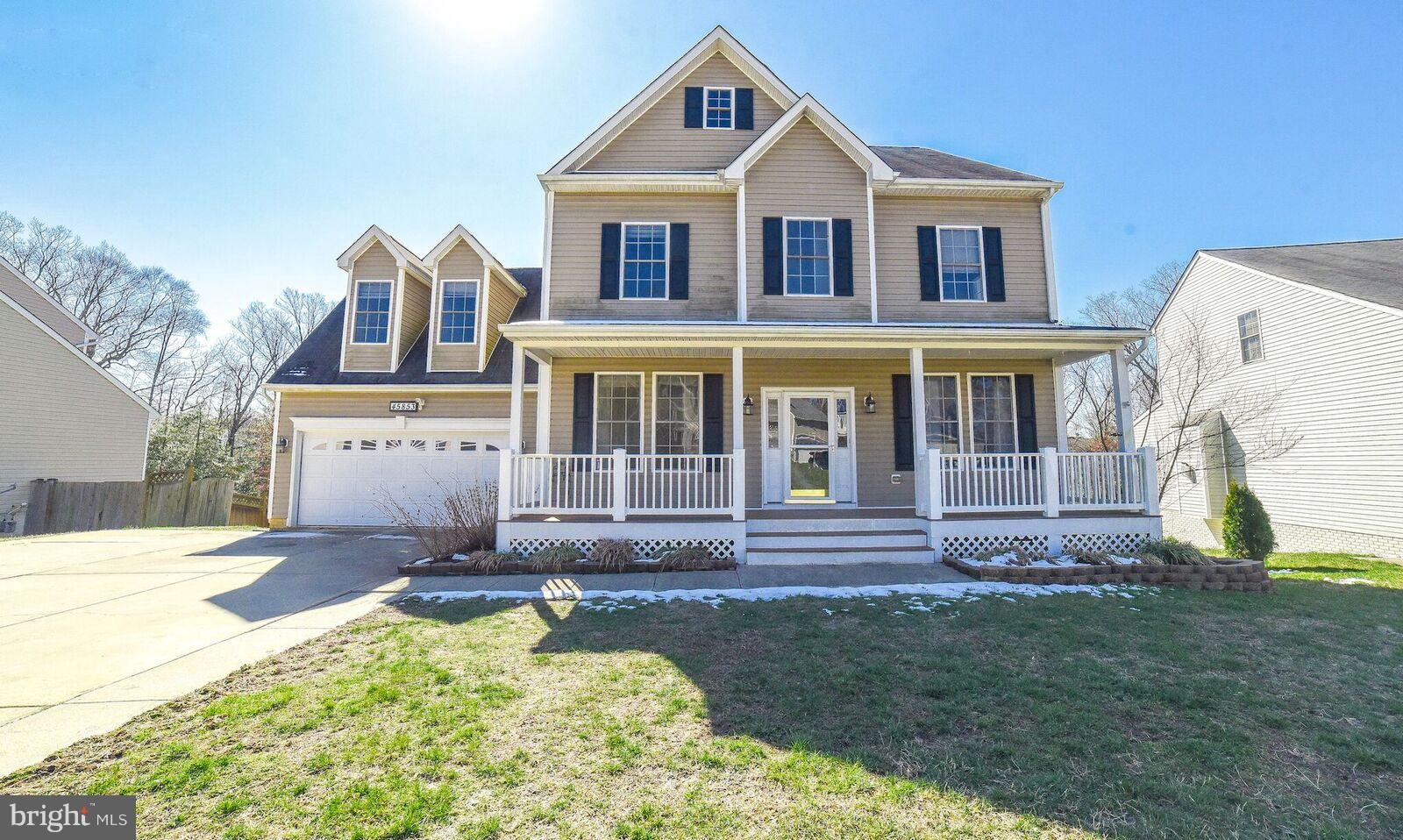 Beautiful Colonial with plenty of space for everyone & an inground saltwater pool for entertaining!  Frml liv & din rooms, den, large kit w/island & ceramic tile, fam rm w/fp, large sunroom doors open to large deck overlooking pool.  Master w/vaulted ceilings, walk in closet, master bath w/sep shower & jetted tub.  Fin basement with in law suite, bed & bath.  Close to base, schools and shopping.