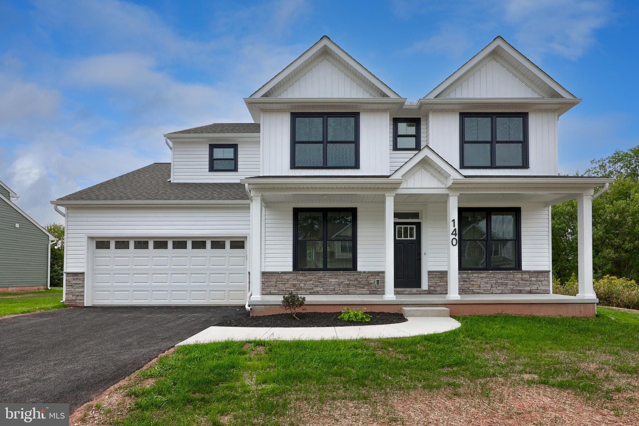 Opportunity to be the first owner in this brand new home! Step into a bright, open-concept layout designed for effortless entertaining. The upgraded kitchen boasts elegant granite countertops and seamlessly flows into the spacious family room, complete with a cozy gas fireplace. A breakfast area is open to the kitchen and offers a door leading to the back patio.  Enjoy the versatility of a formal dining room and a flex space—perfect for a home office or additional living area. The upper level includes A primary suite with a 14' x 5' walk-in closet and luxurious en-suite bath with a walk-in tile shower and dual vanity with extra space. Three additional bedrooms, a guest bath, and convenient laundry area complete the upper level. Easy commute to I-83 and Rt. 30. Convenient to restaurants, shopping, and local amenities.