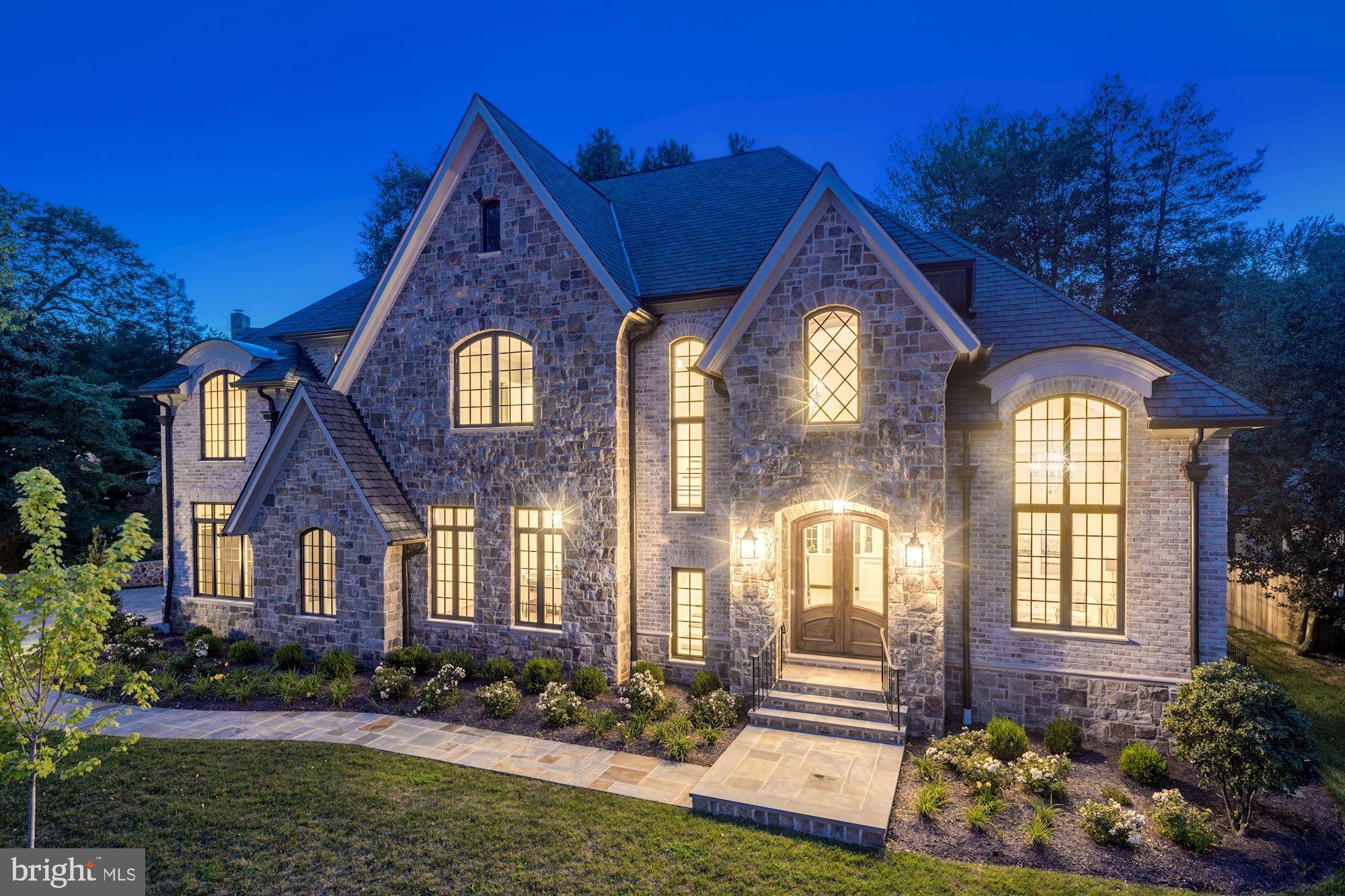 PRIME - NORTH ARLINGTON Location- just 1 block to Washington Golf and Country Club, Marymount University & 2 lights to D.C.  This sunny new construction by Sunline Custom Homes is exquisite in every detail. The property is equally accessible to the Kennedy Center, Washington's cultural, business, and political centers and the dynamic shopping, culinary and commercial area of Tysons Corner. Dulles and Reagan National airports are easily accessible. Gulf Branch Nature Center and the Potomac River hiking and biking trails are within easy walking distance. This gorgeous French Country style home offers over 6690 sq ft of living space with soaring ceilings throughout all three level. The attention to detail is shown throughout the house in the extensive moldings, custom inset cabinetry, 7" hardwood flooring, tile and woodwork. The first floor features an incredible chef's kitchen with Thermador appliances, Calacatta Gold marble countertops and a gracious island, perfect for entertaining or casual family gatherings. The spacious mud room offers a wonderful  drop zone , a huge pantry, a private entrance as well as its own bathroom.  The fully finished oversize garage with 9 foot wide doors and commercially applied epoxy flooring offers plenty of storage space in addition to the two-car bays. The homes gracious flow from room to room allows for both formal entertaining as well as relaxed day-to-day living. The second floor offers a stunning and spacious master suite, and three additional bedrooms, all with en suite baths. The incredibly spacious lower level is ideal for entertaining, complete with kitchen, gas fireplace, media room, exercise room, 5th bedroom and ensuite bathroom. The rear exterior has a lovely custom patio with built-in grill, all centered on a beautiful stone fireplace complete with gas lantern. A lovely stone retaining wall outlines the entire rear yard creating a nice flat area for family fun or entertaining.