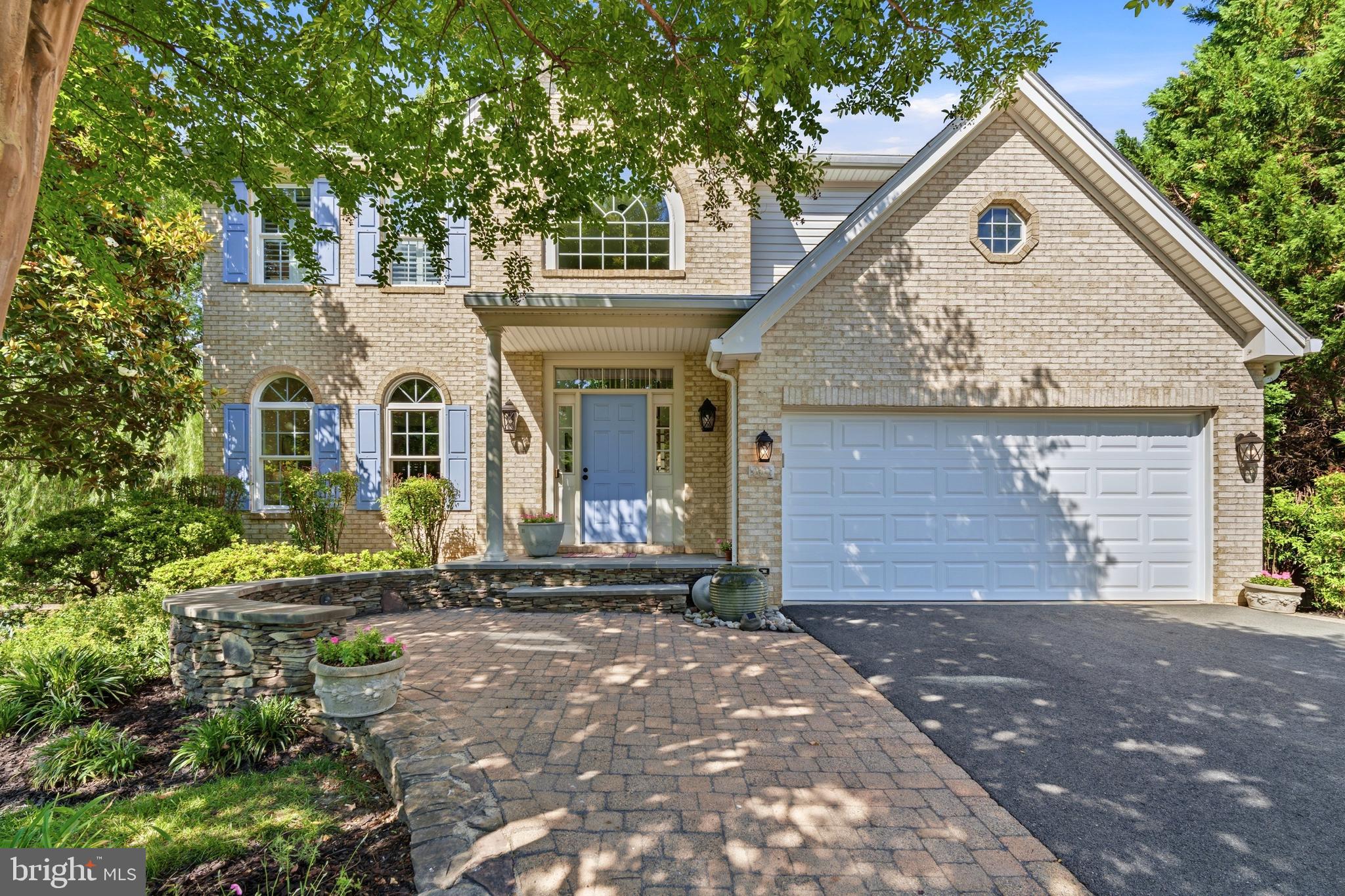 Rare find in Potomac Terrace — a beautifully maintained brick Colonial on one of the neighborhood's largest lots at .36 acres, tucked on a quiet cul-de-sac with exceptional privacy and room to truly spread out. The main level offers a gourmet kitchen with granite counters, white cabinetry, and a bright dining nook wrapped in windows and treetop views. The renovated primary bath is a true retreat: soaking tub, frameless glass shower with pebble tile, and dual vanities. The fully finished lower level is an entertainer's dream with a custom wet bar, wine cellar, fireplace, and rec room with walkout access. The backyard takes full advantage of the oversized lot — curved in-ground pool & spa with new gas heater (2023), expansive paver patio, elevated deck, and lush mature landscaping that creates a resort feel unlike anything else in the community. Major updates: roof (2026), washer & dryer (2026), 75% of windows (2023), rear doors (2023), dishwasher & oven (2021), HVAC & hot water heater (2016), pool refurbished (2020). Near Cascades Marketplace, Rt. 7, and Dulles. Truly turnkey.
