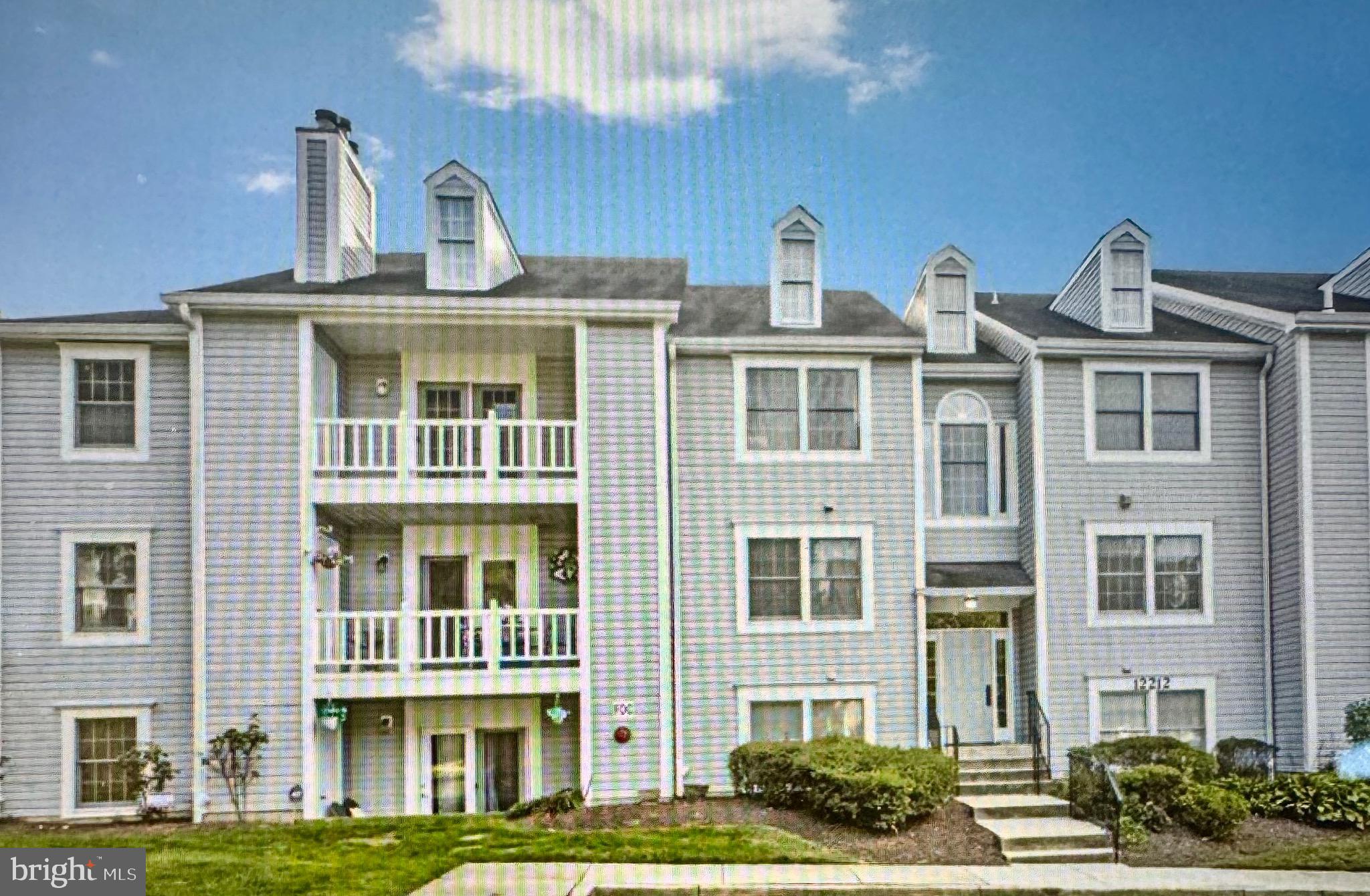 Discover an exquisite 2-bedroom, 2-bathroom residence in the prestigious Waters Edge at North Lake. This elegant unit features a spacious layout with plush carpeting and a cozy fireplace, perfect for intimate gatherings. The modern kitchen is equipped with high-end appliances, including a built-in range, electric oven, and dishwasher, ensuring culinary excellence. Enjoy the convenience of in-unit laundry facilities and a stall shower in the bathrooms. Set on a level lot with year-round access, this property offers serene views of lush trees and woods, enhancing your tranquil lifestyle. The community boasts a luxurious pool, ideal for relaxation and socializing. Located near the picturesque lake, this home provides an exclusive retreat while remaining accessible to local amenities. Experience the perfect blend of comfort and sophistication in this charming garden-style apartment, where every detail caters to a refined living experience.