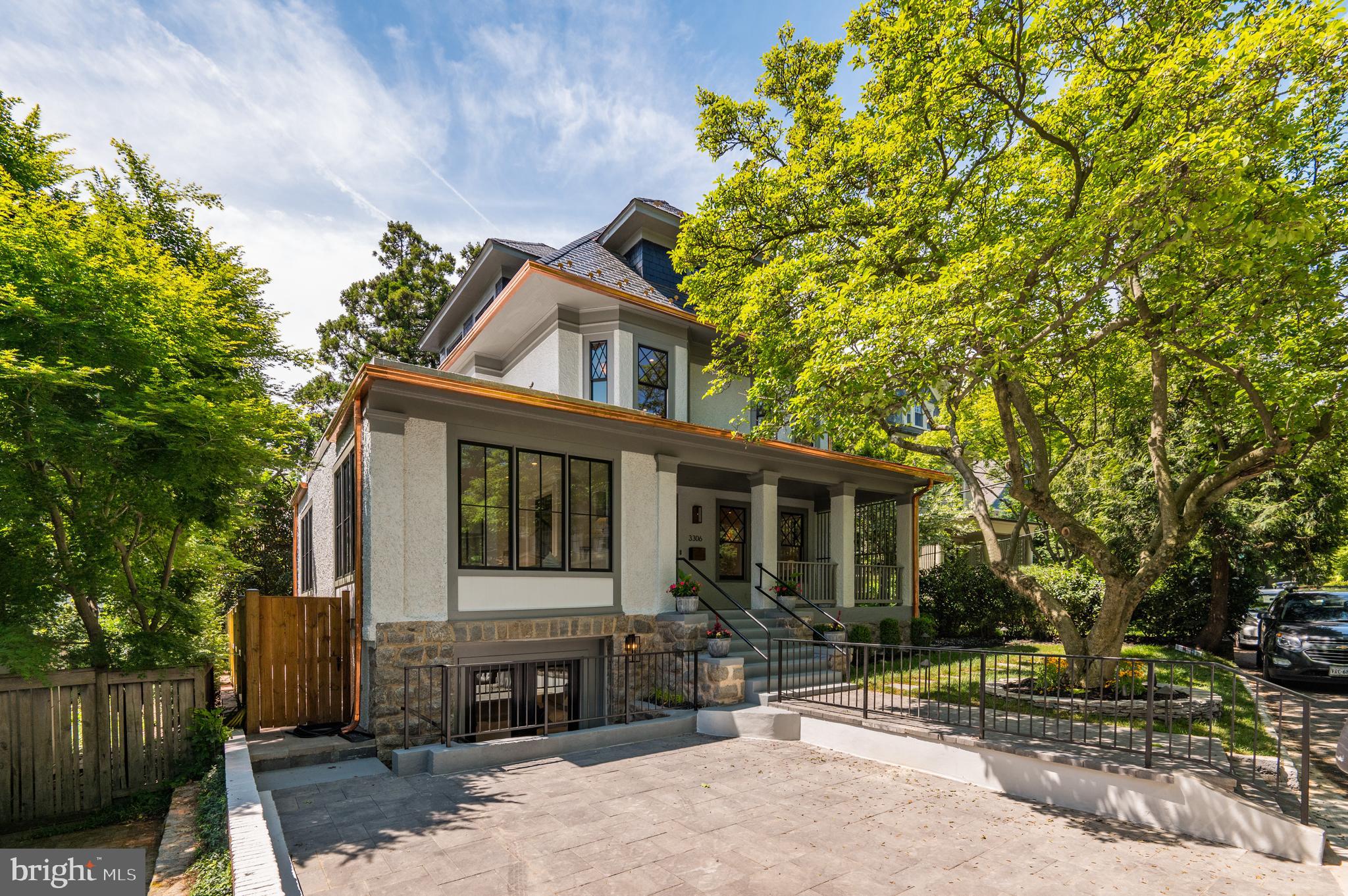 Exquisite renovation of a Craftsman American Foursquare by DILAN HOMES! *DREAM​* location on tranquil Highland Place, a hidden-in-plain-sight "country lane" and historic Cleveland Park's most-cherished street! A wide front porch leads to an expansive interior of nearly 6,000 SF with ample communal/family space, wonderful indoor-outdoor social flow, 9'7" ceilings, and streaming sunlight and leafy views through countless large windows - all pristine and TURNKEY RENOVATED with impeccable finishes and details! 

Main level features living room with fireplace, dining room, open kitchen, family room, and multiple walkouts to the private south-facing backyard with outdoor kitchen! Second floor features multi-room primary suite with en suite bath and walk-in closet, two additional bedrooms, additional full bath, and laundry. Spacious third floor features 2 bedrooms, full bath, and open loft/sitting area. Lower level features bedroom with en suite bath and walk-in closet, large rec room, additional laundry, and powder room. Easy parking in wide driveway and just steps to schools, shopping, restaurants, metro, everything!