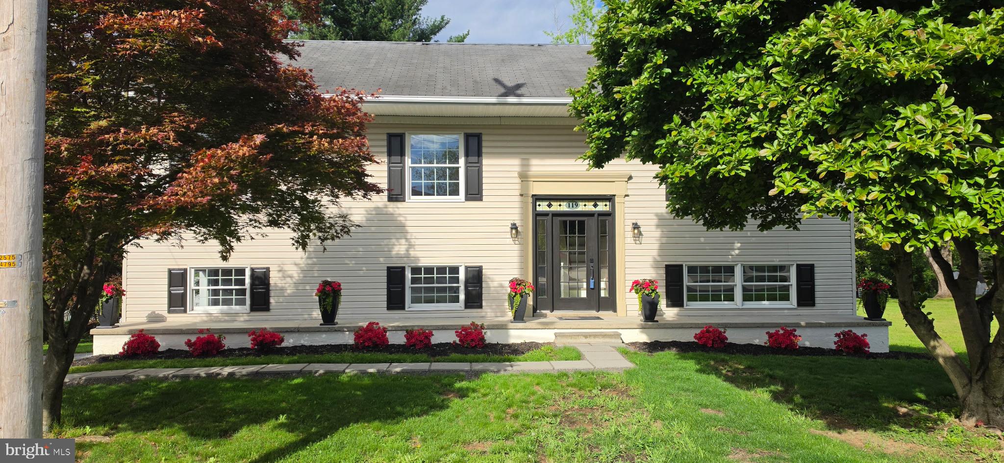 Welcome to 119 Chester Rd, a move-in ready home in East Pennsboro Township offering updated finishes, flexible living space, and everyday comfort. A custom stained-glass transom above the front French door creates a charming first impression. Inside, the home was freshly painted in 2025 and features new luxury vinyl plank flooring and carpet for style and durability. The spacious kitchen offers oak wood cabinetry, stainless steel appliances, a Bosch dishwasher, built-in desk area, and a window overlooking the backyard. The adjoining dining room opens through French doors to a 11x16 deck ideal for outdoor dining, grilling, or relaxing. The .34-acre lot includes mature trees and a built-in fire pit for added outdoor enjoyment. With 4 bedrooms and 2.5 baths, this home provides room to grow and flexible options for today’s lifestyles. Large windows bring in abundant natural light throughout. The finished lower level adds valuable living space with an additional bedroom, half bath, laundry area, and a versatile flex room with glass doors leading to the patio, which is perfect for guests, in-law space, home office, gym, or recreation room. An oversized two-car garage and expansive attic provide exceptional storage. Beautifully maintained and thoughtfully updated, this home offers space, functionality, and outdoor living. The West Enola Fire Company located across the street has a silent alarm system.