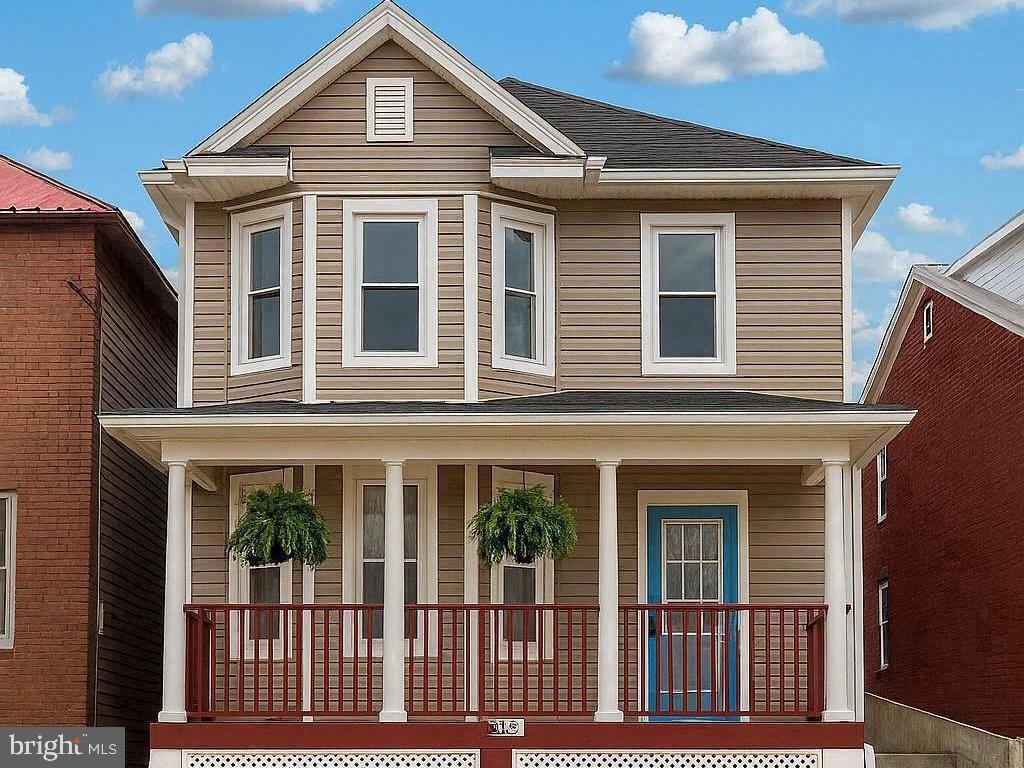 Timeless Charm Meets Modern Convenience in Downtown Martinsburg

Discover the perfect blend of historic character and modern updates in this beautifully maintained 3-bedroom, 1.5-bath Colonial located in the heart of downtown Martinsburg. Just minutes from I-81, local dining, shopping, and the city's thriving historic district, this home offers both convenience and classic appeal.

Step inside and be welcomed by soaring 9-foot ceilings, abundant natural light, and beautiful bay windows that enhance the spacious, inviting layout. Luxury vinyl plank flooring flows throughout the main living areas, creating a warm and stylish atmosphere that's perfect for everyday living and entertaining.

The updated kitchen is equipped with stainless steel appliances, while the recently remodeled full bathroom offers a fresh, modern feel. A convenient main-level half bath adds functionality for guests and daily living.

Whether you're looking for your first home, room to grow, or simply want to enjoy all that downtown Martinsburg has to offer, this move-in-ready Colonial combines timeless architecture, thoughtful updates, and an unbeatable location. Schedule your private showing today and experience everything this charming home has to offer.