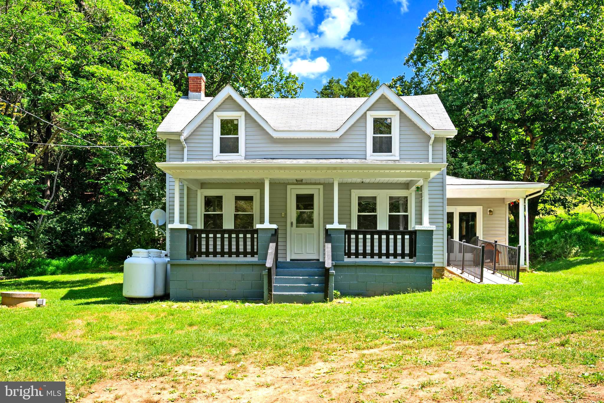 Adorable Two-Story Home on Nearly Two Acres!

Welcome to this charming 3-bedroom, 2-bath home nestled on nearly 2 private acres with beautiful views of Hawksbill Creek. The land is a true highlight, offering a peaceful mix of open space and mature trees with plenty of room for gardening, recreation, pets, or simply enjoying nature. The private bridge provides convenient access while enhancing the property's secluded feel.

Inside, you'll find a cozy eat-in kitchen, dining area, welcoming living room with a wood-burning stove, main-level full bath, and mud/laundry room. A Generac generator, well-maintained well and septic system, disability-friendly features, and a spacious shed add to the home's appeal.

A rare opportunity to enjoy privacy, natural beauty, and country living—all in one special property. Schedule your showing today!