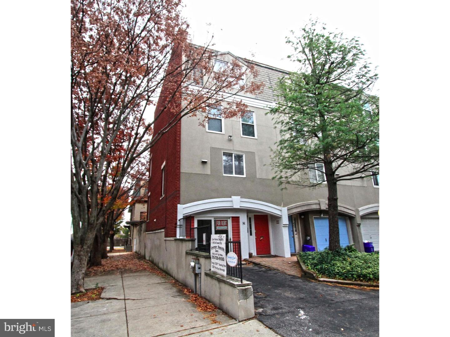 Welcome to  POWELTON VILLAGE located close to the University of Penn and Drexel, as well as in close proximity Spring Garden Bridge, Fairmount Park and Center City Philadelphia.. This enormous home has 4 bedrooms and 3 full baths, a walk out deck in the master suite, a huge deck and yard off of the living room, a gas burning fireplace, and 1 car off street parking. Central air gas cooking, tons of storage, hardwood throughout most of the home, and large rooms throughout. Enter in to a formal foyer. Garage has been converted into a private bedroom suite with private full bath and crawl space storage access. The 2nd floor has a formal sunken living room, romantic fireplace, is flooded with natural light from the slider doors that open to views of the yard and deck. This outdoor space has 2 tiers and is perfect for entertaining. There is a small walk up to the formal dining room overlooking the main living space and the kitchen is a galley style with all appliances included, plenty of space to cook and a bar area as well. The 3rd floor has 2 large bedrooms a shared hall bath, storage vanity, and soaking tub/shower combination, and in the hall there is a side by side laundry closet with washer and dryer included. The 4th floor has the 2nd private suite with private deck off the rear with views of Philadelphia, private bath with huge tile shower and glass enclosure, and a huge closet as well in this master suite. Many nice features in this extremely large home in a very walk-able neighborhood. We welcome your visit. Move in ready!