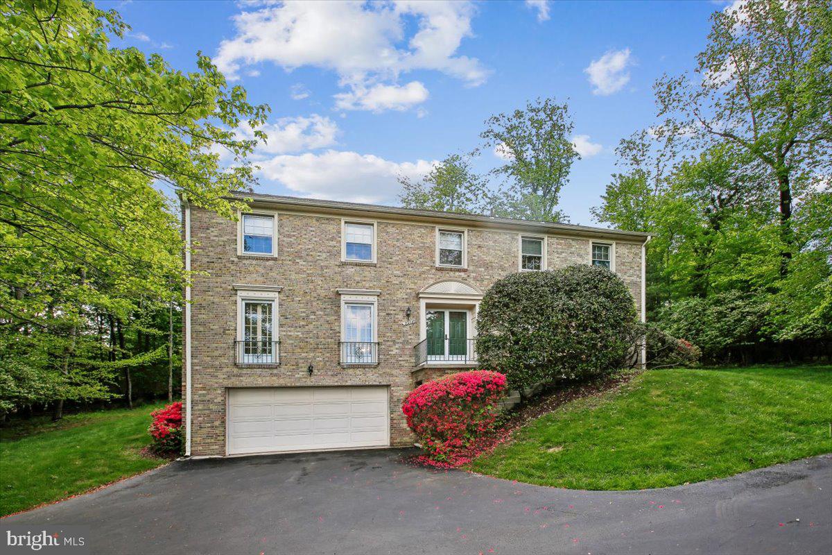Every surface sparkles in this large 5BR 4.5 BA MITCHELL & BEST quality home, boasting a classically designed 3,366 sq ft of fine living above grade, over 5,000 finished sq ft in total, 5 BR and 3 BA plus laundry on the upper level alone, plus a 4th full bath in the walk-out lower level. This elevated Colonial is ideally situated in Potomac on a quiet private driveway just minutes to Potomac Village, Potomac Library and everything in the award-winning Winston Churchill HS cluster.

Perched high above neighboring homes, this exceptional residence enjoys a commanding hilltop setting on a serene 0.5-acre lot, offering both privacy and sweeping treetop vistas. Rarely available, 9208 Fall River Ln. impresses with signature architectural features such as elegant French balconies across the front elevation, accenting the home office, powder room, and living room, as well as recent improvements including new roof (2021).

A gracious open living and dining space is enhanced by fresh paint, newly refinished hardwood floors, and lush green vistas from every window. Step inside to find a spacious living room accented with French balconies (four total throughout the front of the home) and formal dining room on the left, a powder room and an elegant study/office towards the front. A cozy family room in the back with a stone hearth and fireplace and double doors that open to the paved patio and beautifully landscaped backyard. The completely remodeled eat-in kitchen boasts updated countertops, SS appliances, electric cooktop, front door, refrigerator, microwave over the oven, and plenty of pantry space.

Upstairs, you’ll find all refinished hardwood floors, five spacious bedrooms and three full baths. The owner's suite features two walk-in closets, dual exposures of windows, and a bathroom with a separate water closet and walk up to a decadent soaking bathtub and dual vanities. Bedrooms 2, 3, 4, and 5 share two hallway bathrooms, and an upstairs laundry room offers the ultimate convenience for today’s modern buyer.  

The fabulous basement is an entertainer's haven ready to host with its own wet bar, open recreation space, built in shelving, beautiful wood paneling, and another full bathroom. SO many uses for this versatile space, all with its own rarely available separate entrance. Basement also offers access to the front-loading two car garage and a utility room.  A great opportunity to own in beautiful Pine Knolls, this home combines an estate-like setting with exceptional convenience, just moments to all the walking trails, community parks, playgrounds, shopping, major commuter routes I- 270/495 and more!