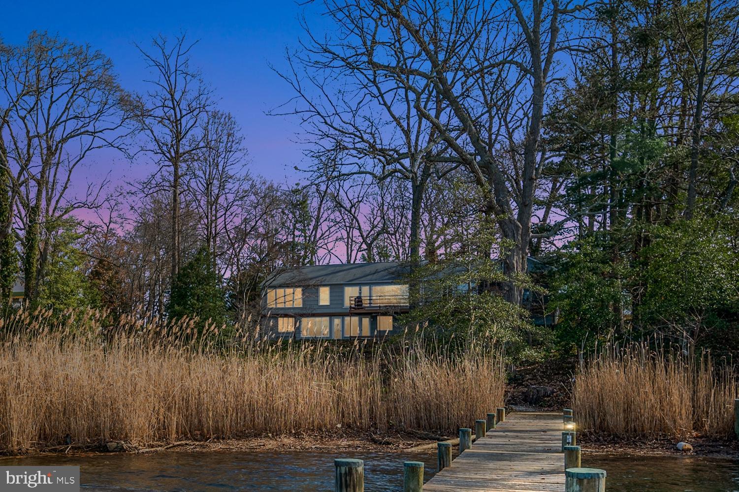 Stunning views on MillCreek! Welcome to 1910 Hidden Point Road, a 3 bedroom 3 bath home nestled on a .77 acre lot along the shores of the highly sought after neighborhood of St Margarets in Annapolis.  This handsome,  4,000 plus Sq Ft rancher, a truly an exceptional property, is being offered for sale for the first time in over 50 years. First, Step onto the expansive rear deck, stretching the length of the house, and behold the breathtaking vistas of Mill Creek. The home offers an open plan living room with unrivaled water views, a wood burning fireplace, gorgeous hardwood floors, a gourmet kitchen and an open dining space. In addition, an entirely separate family room with a second primary main floor bedroom offers a unique multigenerational feature. This side of the home is equipped with a kitchenette and separate entrance. A screened porch facing the water offers a perfect way to start the day with a coffee or respite at the end of the day with a libation. The lower level of this remarkable abode
has a partially finished basement (966 sq ft finished of the 2037 sq ft) with outdoor access, windows, large office space, living area and an extra room that can be converted to a bedroom or exercise room.

Venture down to the private pier, boasting aprox 6-8" MLW, where the tranquil waters of Mill Creek await. The pier is situated on aprox 100 feet of private shoreline, completing this Annapolis waterfront estate. Mill Creek quickly opens to the Chesapeake Bay, providing easy access to the Severn River, and Downtown Annapolis, giving you the Annapolis boating lifestyle you’re after. 

 Renovate and make this your waterfront dream home!