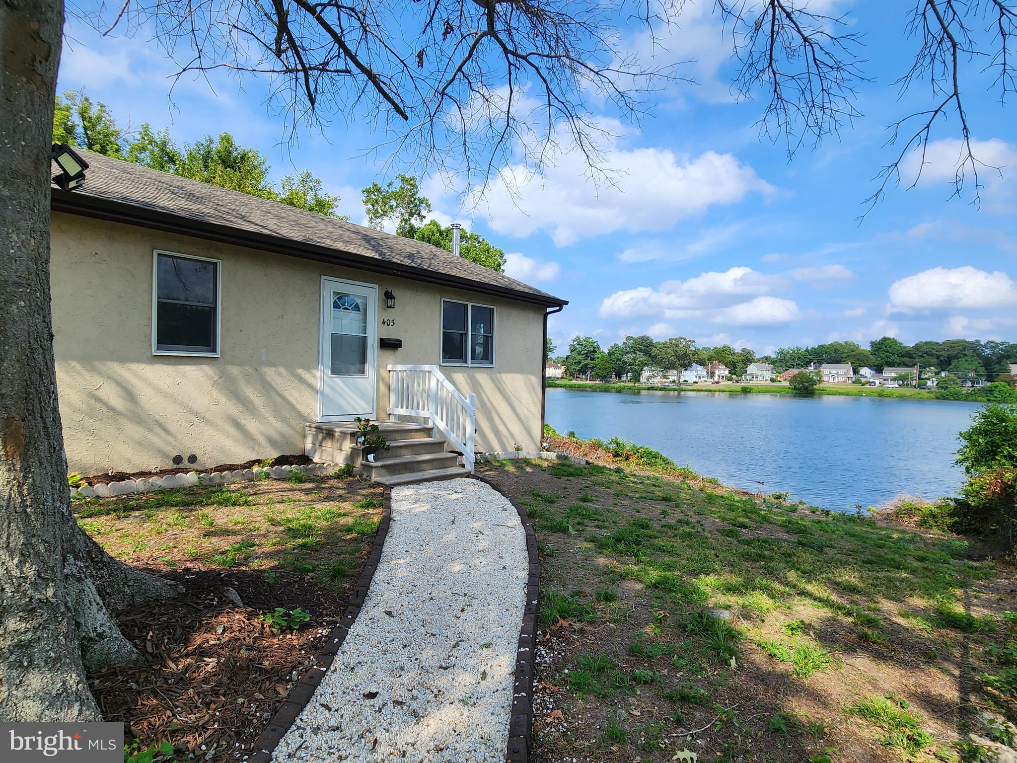 Nestled on the serene banks of Johnson Pond, this charming ranch-style home offers a unique blend of comfort and community. Recent improvements include New Roof,  New Appliances, Updated Bathroom, flooring and interior painted!!  With three spacious bedrooms and one and a half bathrooms, this residence is perfect for those seeking a peaceful retreat while remaining connected to a vibrant neighborhood. This waterfront property provides endless opportunities for relaxation and recreation. The expansive 0.25-acre lot allows for outdoor activities, gardening, fishing from your private residence or simply soaking in the natural beauty that surrounds you. Residents benefit from nearby parks and recreational facilities, perfect for leisurely strolls or picnics. The local schools are known for their commitment to excellence, ensuring a supportive environment for lifelong learning. Public services are readily accessible, enhancing the convenience of daily life. This home, built in 1988, features durable stick-built construction with synthetic stucco, ensuring both longevity and low maintenance. With off-street parking and a driveway, convenience is at your fingertips. Experience the joy of waterfront living in a community that values connection and comfort. This property is not just a house; it's a place to create lasting memories.
