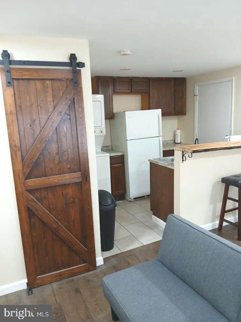 Two unit, one vacant and one occupied in Brooklyn. First floor is a studio and second floor is a one bedroom unit.