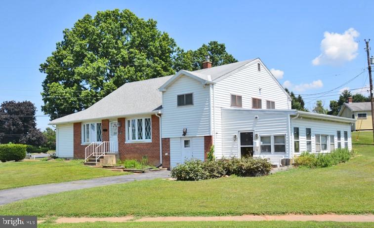 Great home with great bones! This is an ''AS IS SALE!'' Lots of updating to do on this property including paint and carpet but there is hardwood under most of the carpet, the kitchen has an tons of cabinets & storage plus island. LL features tiled FR with fireplace, storage, laundry area and access to the garage and enclosed porch...continued