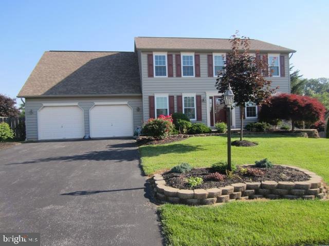 Immaculate landscaping greets you at this completely updated 4 BR colonial. $85K in upgrades, including new ultra low-e energy efficient replacement windows! Kitchen has granite & SS appliances. Huge 34x14 deck leads to private, fenced backyard. Large MBR has bath w/tiled shower & granite floors. A finished Bonus room above garage and a finished basement too!