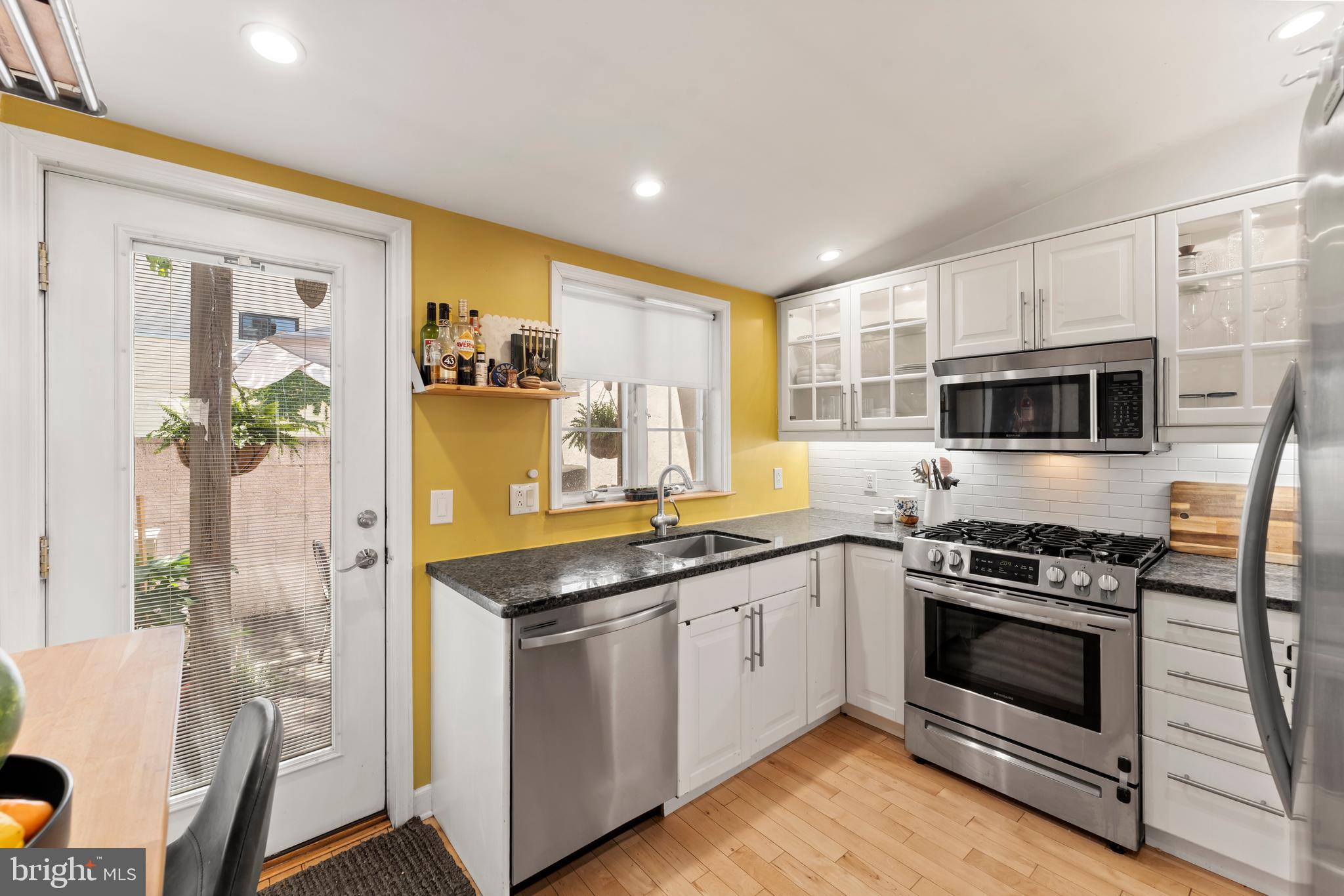 Welcome home to 1304 S Howard Street. This beautiful 3 story rowhome sits on a quiet block in the heart of Pennsport! Step inside this fully renovated 2 bedroom + bonus space luxury retreat that will be sure to grab your attention! The first floor features: an open concept living /dining room combo space, hardwood floors and an updated kitchen with white cabinets, granite countertops and stainless steel appliances. Just off the kitchen sits your 1st outdoor space of two! If you love to entertain, you'll love the back patio oasis! Continue to the second floor featuring: the 1st spacious bedroom with a walk-in closet and a fully updated spa-like bathroom with a jacuzzi tub/shower combo! Head to the 3rd floor where you'll find the 2nd bedroom with a large built in closet unit and your bonus / flex space that could be used for just about anything! Just off the 3rd floor you'll find access to the bi-level deck space perfect for those warm summer nights! To complete this home, you have a basement with a washer/ dryer and plenty of space for additional storage! Don't miss your chance to rent out this one of a kind!  (Tenant occupied until end of August & open to staying if an investment purchase)