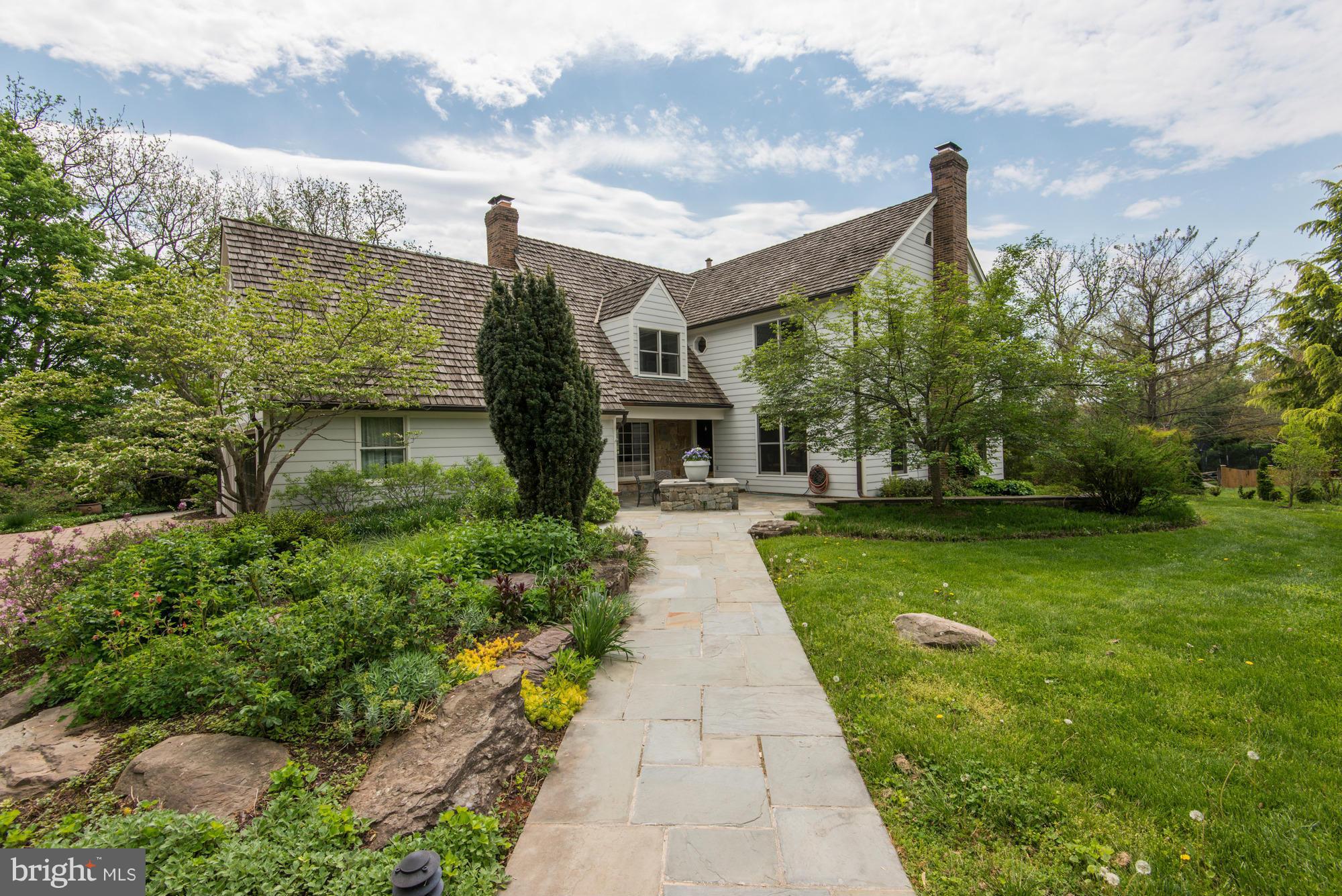 One of McLean's favorite neighborhoods - Countryside. Williamsburg style colonial on picturesque cul-de-sac amidst almost one acre of  award winning gardens.  Home features approximately 4,500 sf, gorgeous hardwood floors,  4 bedrooms, 4.5 baths,  wonderful master suite, beamed family room.  Entire house - interior and exterior just painted -  this home truly sparkles. OPEN SUNDAY 5/10 FROM 2-4
