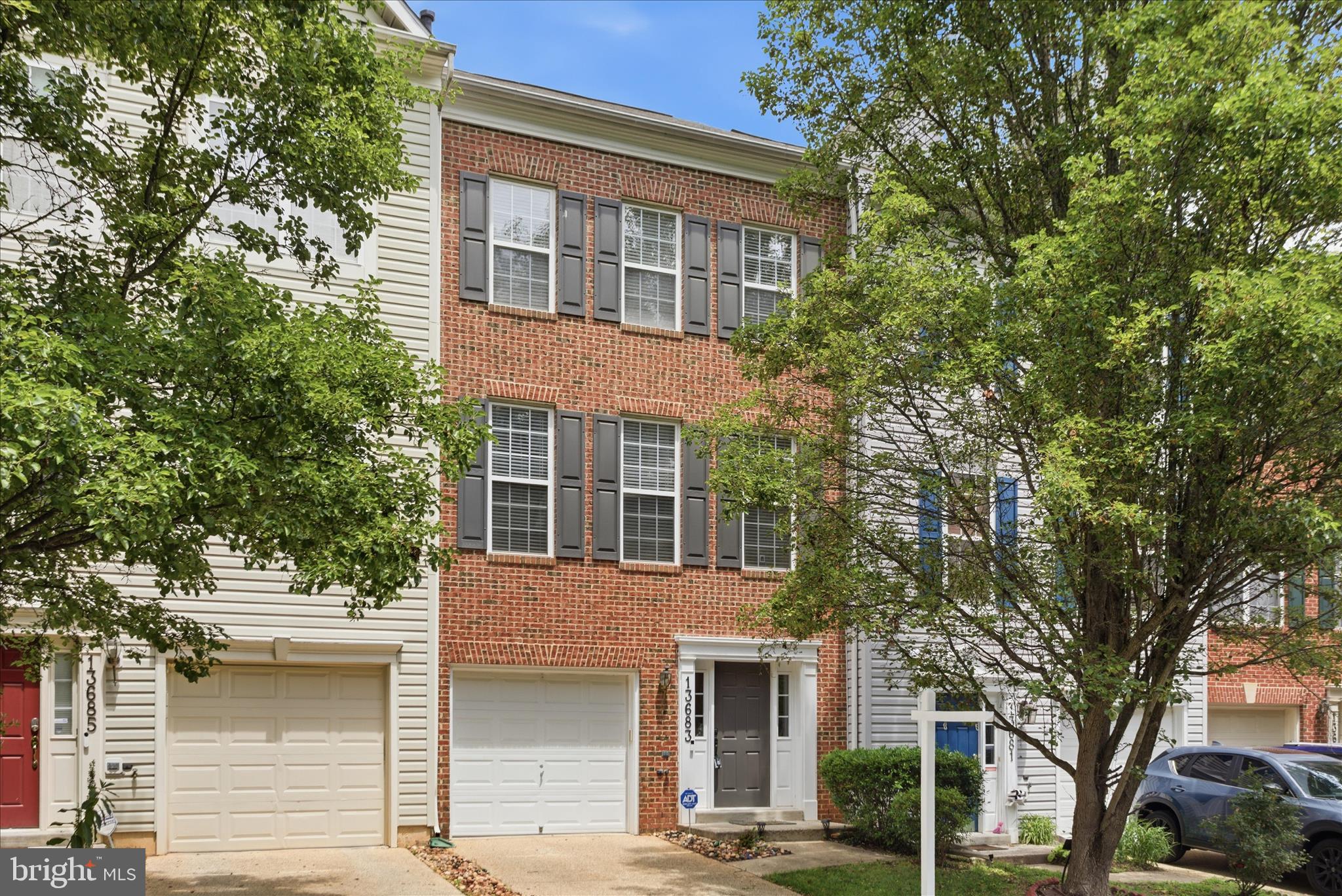 Rare opportunity to own a beautifully maintained townhome in the sought-after Autumn Glen community offering over 2300 sqft of living space across three finished levels. This spacious home features 3 bedroom, 2 full baths, 2 half baths, and versatile lower-leavel room that can easily serve as  a 4th bedroom, home office, den or recreation space. A private driveway that leads to the attached one-car garage, while inside you'll find soaring ceilings, abundant of natural light, beautiful hardwood floors, and brand-new carpet throughout. The spacious kitchen offers abundant cabinet and countertop space and has all-new stainless appliances (2026), including gas stove. The kitchen opens seamlessly to the dining area and entry to the main level living room. The kitchen also provides access to the rear deck, creating the perfect setting for outdoor dining, grilling and entertaining. Upstairs, a spacious primary suite features walk-in closet and private bath with dual vanities, a soaking tub and separate standing shower. Two additional generously sized bedrooms, a full hallway bathroom and a conveniently located upper level laundry closet complete the upper floor. Additional improvements include a recently replaced HVAC system, providing peace of mind for years to come. Located in the desirable Autumn Glen community, residents enjoy quiet streets with sidewalks and a neighborhood playground.  Conveniently situated near shopping, dining, parks, and major commuter routes, the home is approximately 1 mile from the Germantown MARC Station, making commuting a breeze. Combining size, updates and an exceptional location, this home offers everything today's buyers are looking for.