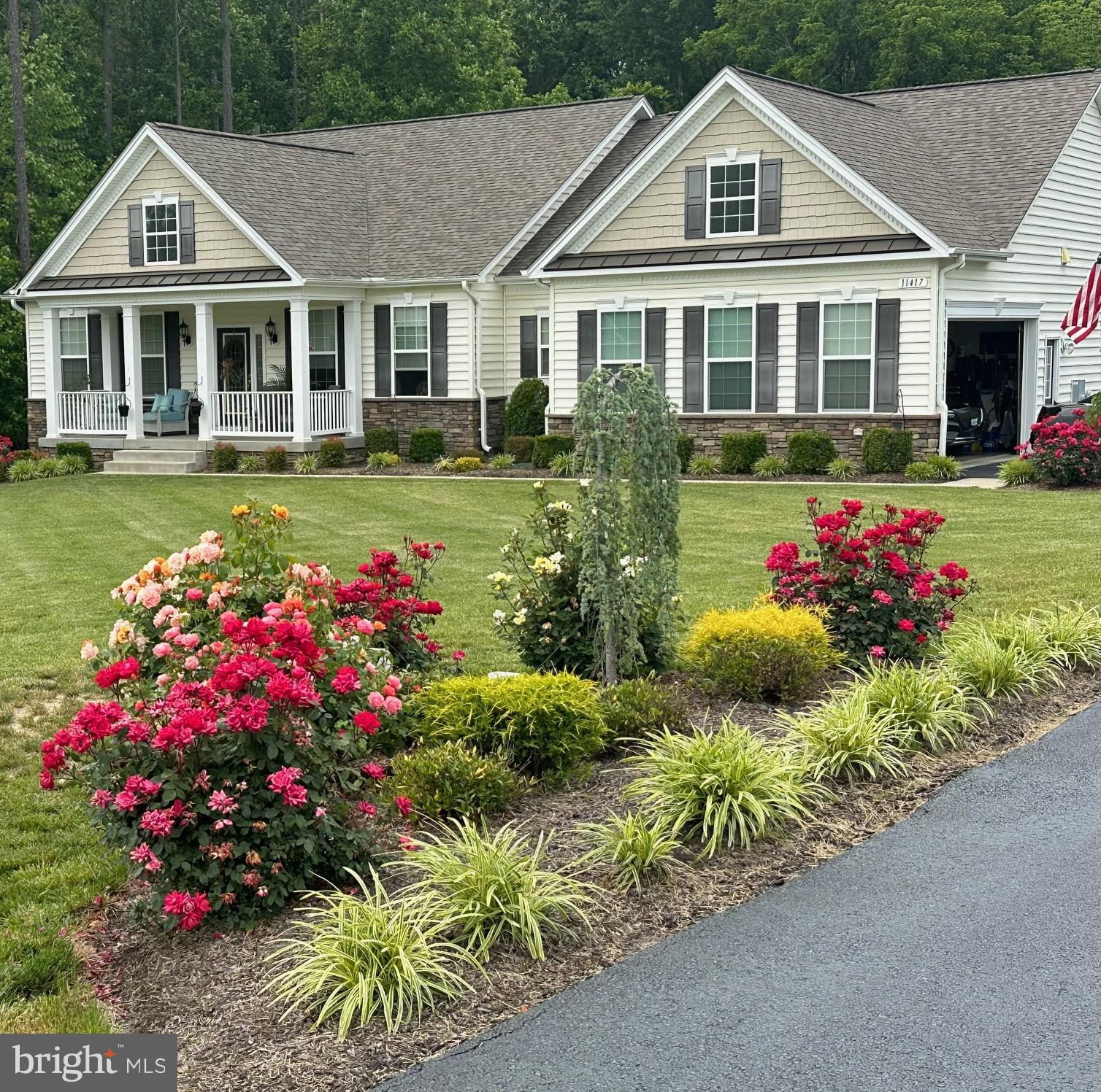 Beautiful and meticulously maintained 4-bedroom, 3.5-bath rambler offering nearly 3900 finished square feet of living space in the highly desirable Oakwood Estates Community, in Dahlgren, Virginia. Situated on a quiet, private 1-acre lot bordered by mature trees along the side and rear, this home delivers both privacy and convenience in an exceptional setting.
 The main level features an open concept design with 9-foot ceilings, hardwood flooring throughout the main living areas, and a spacious family room that flows seamlessly into the large custom kitchen and breakfast area. The kitchen is well appointed with custom cabinetry and offers an ideal layout for both everyday living and entertaining. The breakfast area opens directly to the rear deck, extending the living space outdoors. A formal dining area and expansive living space complete the first-floor entertainment flow.
  The primary suite includes a tray ceiling and a well-appointed en-suite bath. Additional main-level bedrooms are generously sized, each with comfortable layouts and carpeting.
 The finished lower level-professionally completed by builder-adds significant living space and versatility, featuring a large family room, sitting area, and an impressive partially soundproofed 17x28 media, music, or home theater room. In addition, a 4th bedroom and full bath are included on lower level. The lower level is 75% finished and includes additional conditioned unfinished space of 1000 square feet for storage.
  Outdoor living is equally impressive with a custom rear patio and sidewalk leading to the walkout entrance to lower level. The underside of the deck has been finished to a mini garage with electric to house lawn tractor, patio furniture and other hobbies and implements.
Additional space includes an oversized 2+ car garage, and expanded driveway that can accommodate 10+ vehicles, offering exceptional parking convenience for gatherings and guests.
  Residents of Oakwood Estates enjoy community amenities including a pool, playground and Recreation Center located within easy-walking distance from the home. With over $100,000 in thoughtful improvements and a location within a rapidly appreciating community where new construction in the next and final section is averaging significantly higher price points, this home presents an outstanding opportunity for turnkey living in a highly sought after neighborhood.