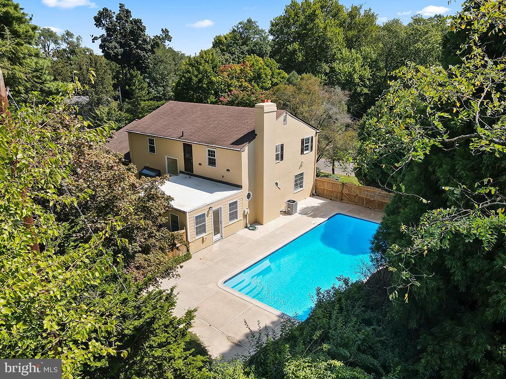 *Please note that most photos are from the previous listing. The property now is fully fenced in with an electric gate at the beginning of the driveway and an additional safety fence around the pool.* 

Your new home awaits on a quiet, cul-de-sac street moments from downtown Media, PA. This bright and stately home is inviting in all seasons, but Summer is when it absolutely shines! Sitting on nearly half - an - acre secured by a gated driveway and fencing around the property’s perimeter*, there are plenty of ways to enjoy the land - whether it’s floating on a raft in the heated in-ground pool, grilling on the newly built deck, or tending to your garden.

Inside, the spacious foyer opens to a formal living room and dining room, both with refinished hardwood floors and resplendent with natural light. The eat-in kitchen features stainless appliances, a large pantry, and plenty of space to move around. Adjacent to the kitchen, there is an over-sized extra refrigerator and freezer on the way to the first of two home office suites both with custom built-in cabinetry and intricate woodwork. This wing of the home also houses the laundry room and a full bath, which creates options for a myriad of living arrangements.

Upstairs, the primary suite offers two walk-in closets and an oversized bath. Three additional bedrooms and a full bath with tub complete the upper level. An abundance of storage and closet space on this level - and throughout the whole house - means everything will have a place.

The finished lower level includes a recreation room, full bath, and additional bedroom. Access to your two-car garage from this level makes going from your car to your home convenient no matter the weather. Under 1.5 miles to the heart of Media with its award-winning restaurants and shops. Moments from the train station, close to I-476, and a short drive to PHL International Airport.