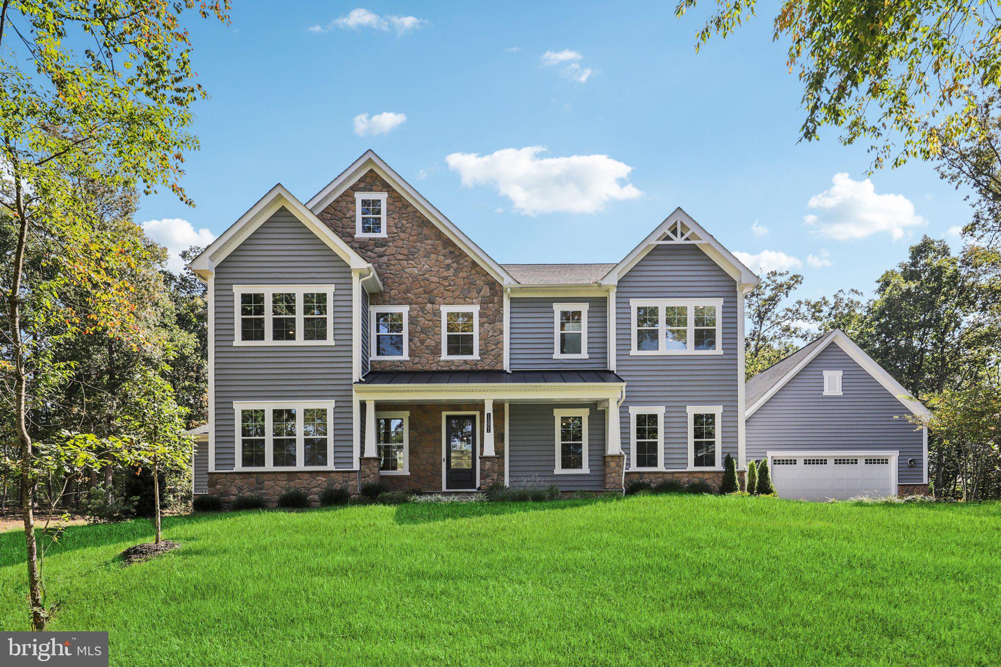 14801 Fauquier Pines Ct is a new move-in ready home on acreage in Nokesville, VA with a total square footage of 8,261. Designed with an extensive grand 2-story foyer, this home plan warmly greets your guests. Complete with dining, foyer, great room, and primary bedroom tray ceilings, the formal dining and flex room lead you to a spacious beamed ceiling great room, kitchen and first floor bedroom with full bath. Includes a sun-room off of the great room. The owners entry features built in cabinets and a private entry to the main level bedroom with ensuite full bath. All bedrooms have their own private baths and walk in closets. The expansive Primary suite has dual walk in closets, sitting area and primary grand bath including a free-standing tub and spa-like shower. This design offers a finished recreation room and the basement bedroom and full bath are complete for your convenience. Huge 4-car garage. READY TO MOVE-IN! 
Up to $10,000 total closing cost is tied to the use of DHI Mortgage.
*Photos, 3D tours, and videos are representative of plan only and may vary as built.
