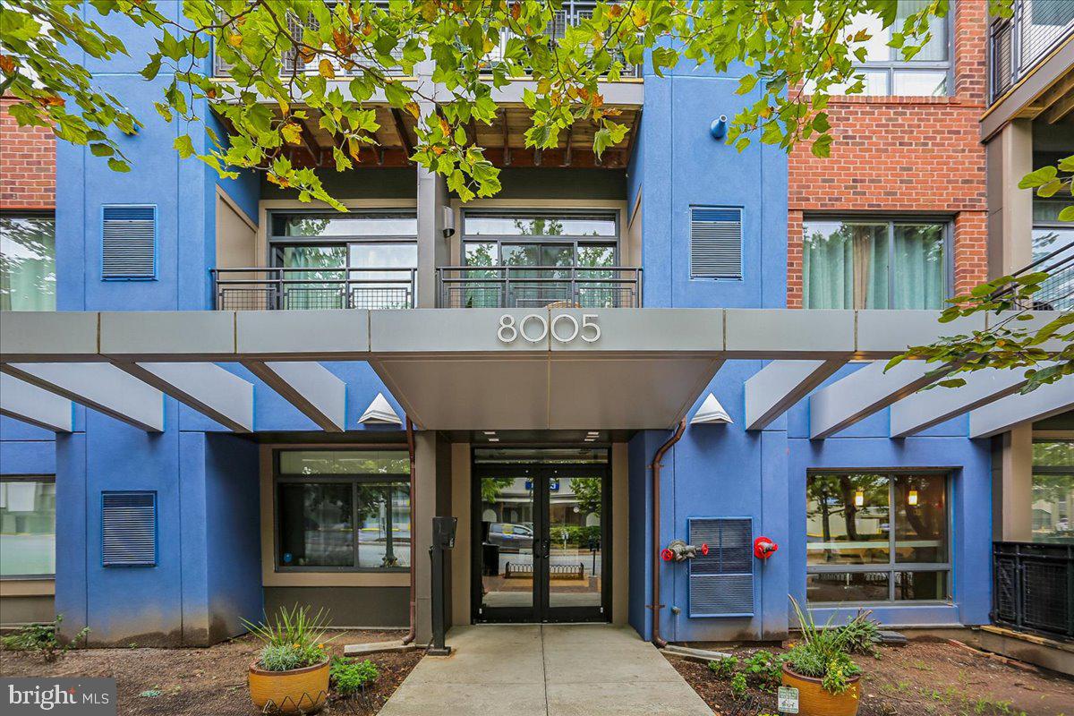 Welcome to Unit 312 at 8005 13th Street: a corner unit residence that gets the details right- high ceilings, hardwood floors, and well-proportioned rooms keep the space comfortable and clean without feeling sterile. A spacious floor plan at almost 1300 square feet, this home is thoughtfully designed with tons of storage, a full-sized washer and dryer, two bedrooms each with their own full bath, plus a bonus room perfect as an office or a creative space. The kitchen and living room are open concept allowing you to enjoy your family and friends as you cook meals or hang out with a glass of wine.  Building amenities include an exercise room and a lovely rooftop deck with a grill, party room, and bike storage.  Situated on the border of DC with a walk score of 92, this home is in close proximity to the red-line metro (0.8 miles), Whole Foods (0.65 miles), the AFI (1.1 miles), and the downtown SS Farmers' Market, restaurants and shops (0.9 miles).  as well as downtown Takoma Park (1.8 miles). Open house on Sunday July 12th from 2-4pm.  Come check it out!