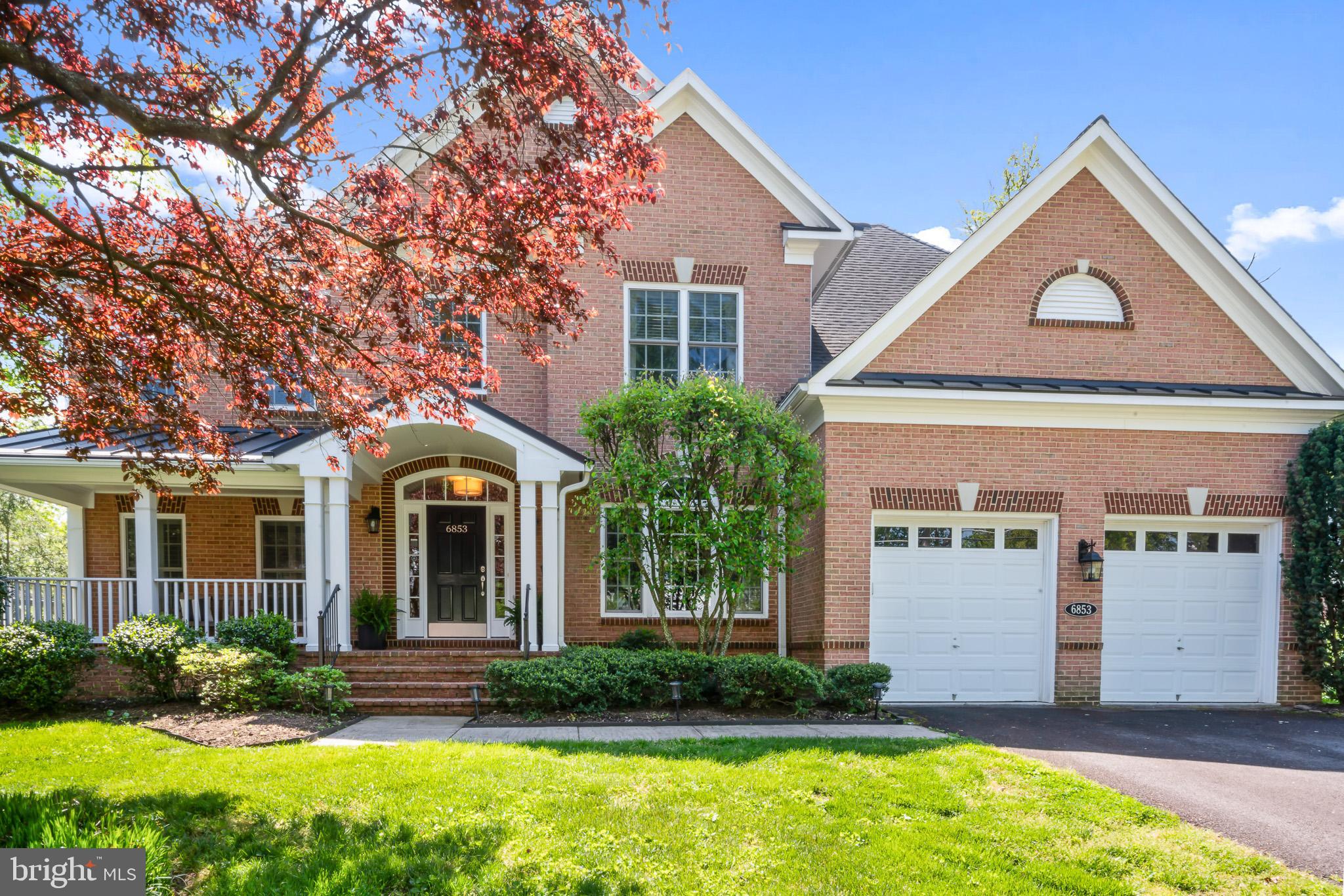 Welcome to luxurious yet comfortable living in this 5-Bedroom, 4.5-Bathroom custom home
that seamlessly blends the indoors with the outdoors. Situated within easy walking distance of
McLean HS and Longfellow MS, this stunning 6100 square foot sun-filled residence combines
classic colonial charm with contemporary sophistication.
The broad, shaded porch welcomes you into the main level which boasts formal living and
dining rooms, a sunny work-from-home office just inside the front door, and an expansive
open-plan kitchen/family room enhanced by a gas fireplace and integrated ceiling speakers. The
handsome gourmet kitchen features a center island, stainless steel appliances, granite
counters, tile backsplash, 42” raised panel cherry cabinetry, and pantry. Start each day in the
light-filled, adjoining breakfast area that opens onto the deck’s tree-top view. Enjoy your
natural surroundings while dining on the secluded deck or in your fenced backyard oasis. The
mud room links to the attached two-car garage which includes a storage alcove.
Natural oak hardwood floors envelop the main level, upper hallway, and entire primary
bedroom suite. Four upper-level bedrooms, including a lavish primary suite with tray ceiling,
sitting room, dual walk-in closets, and sumptuously expansive sunlit bathroom hosting separate
vanities, soaking tub, and shower with bench.
The fully finished walk-out lower level is an entertainer’s dream. Host friends on the patio and
revel in surround sound, wireless lighting, and an outdoor TV. The lower level also provides a
recreation room with a full bar, a spacious 5th bedroom/media room, full bath, and large
workshop with tons of additional storage space.
Upgrades include plantation shutters, elegant molding and trim, and an upper-level laundry
room with large-capacity machines; plus modern amenities such as entire-home surge
protectors, UV sanitizing, 2-zone HVAC (2 gas furnaces and 2 AC units) with integrated
humidifier, 75-gallon water heater, wired for TV and internet connectivity in every room, and a
security system plus gas generator for peace of mind. Even a wireless dog fence for pet owners.
NO HOA!! Close to downtown McLean, and convenient to major routes of I-66, I-495 and GW
Parkway. Luxury, location, and exceptional design make this McLean residence a MUST SEE.