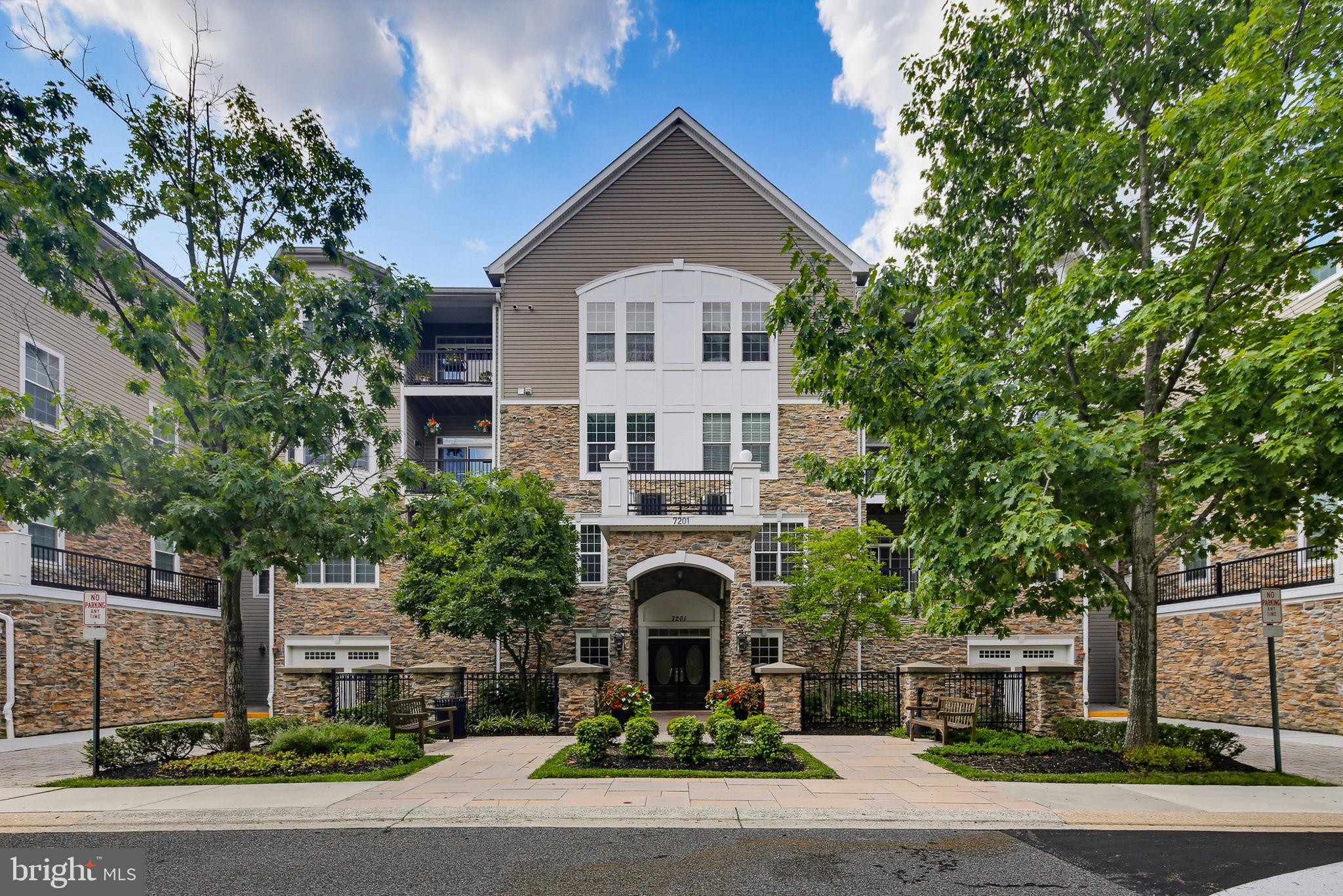 Welcome to 7201 Travertine Drive, unit #404!  A beautifully maintained fourth-floor condominium in the highly desirable Highlands at Quarry Lake, offering comfortable one-level living with elevator access and a thoughtfully designed floor plan. 

The inviting family room and formal dining room feature rich hardwood flooring, creating an elegant space for everyday living and entertaining. The spacious kitchen is appointed with hardwood flooring, granite countertops, white appliances, and breakfast area. Just off the kitchen, the family room also features crown molding and opens through a sliding glass door to a private balcony overlooking the peaceful courtyard, the perfect place to relax and unwind. 

The generous primary suite offers plush carpeting, a large walk-in closet plus a second closet, and a private en-suite bath with a dual vanity and walk-in shower. The second bedroom also features carpeting, a walk-in closet plus an additional closet, providing ample storage. A full hall bath includes ceramic tile flooring, a single vanity, and a tub/shower combination. Completing the home is a convenient laundry room for daily tasks and chores. 

Enjoy low-maintenance living in a sought-after community with exceptional amenities including a walking/jogging path, fitness center, community center, outdoor pool - all just moments from Quarry Lake's shopping, dining, and major commuter routes. Come take a look today and make this beautiful property yours!