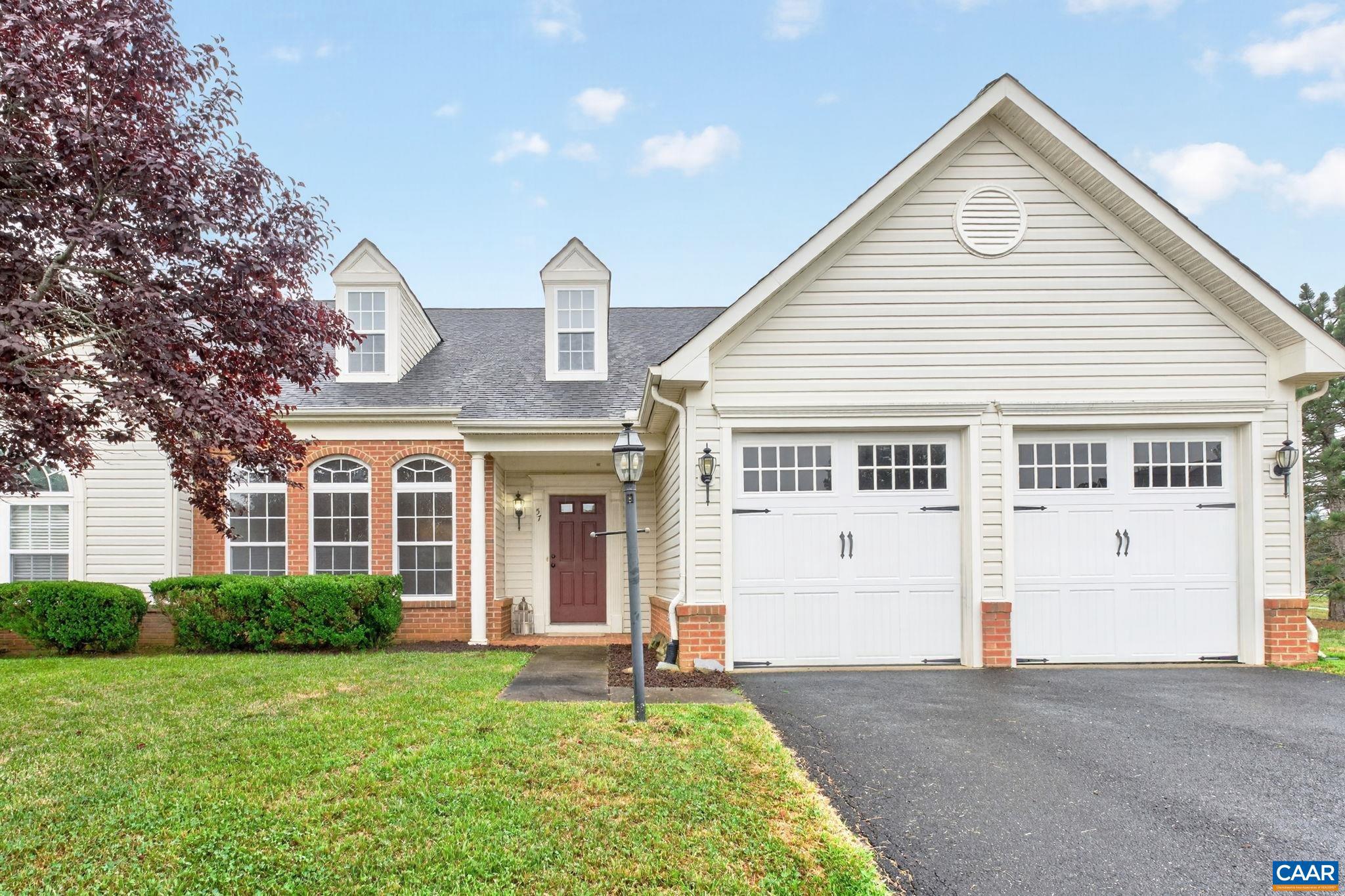 Welcome to easy, main-level living in the sought-after Spring Creek community! This beautifully maintained end-unit villa offers 2,455 square feet of thoughtfully designed living space with a desirable zero-entry floor plan. Step inside to find vaulted ceilings, hardwood floors throughout the main living areas, and a light filled, open-concept layout perfect for everyday living and entertaining. The spacious first-floor primary suite features 2 walk in closets and a luxury bathroom with whirlpool tub, while a dedicated home office offers the ideal work-from-home space. The bright kitchen features a breakfast bar, island, solid surface countertops, abundant cabinetry and opens to a large morning room with windows all the way around. Upstairs, you'll find a loft, two extra large bedrooms with walk in closets, full bathroom and an unfinished storage room. Enjoy the attached two-car garage, private setting, and low-maintenance lifestyle in the gated, amenity-filled Spring Creek community. This exceptional home combines comfort, space, and convenience in one of Louisa County's most desirable neighborhoods.,Solid Surface Counter,Wood Cabinets