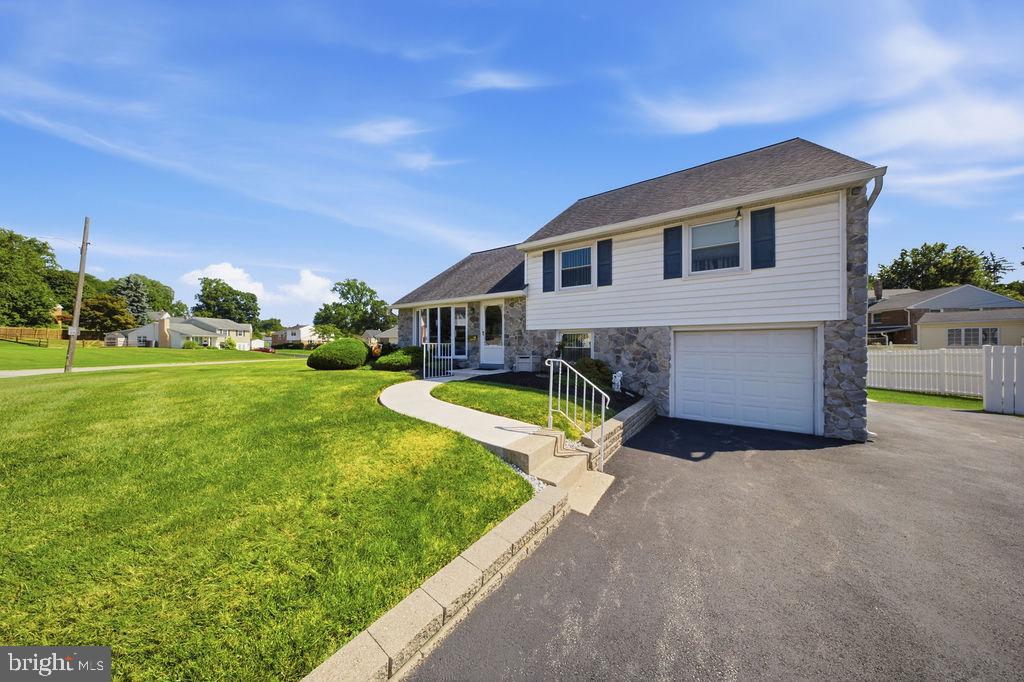 COMING FRIDAY 7/24! This updated, beautiful, 4 bedroom 2 1/2 bath home in Springfield's wonderful "Dream Valley" community has so much pride of ownership inside and out and only a life style change makes it available! The lovely outside corner lot is spacious and the curb appeal is beautiful as this home boasts a stone front, well-manicured lawn, oversized driveway and attached garage. The bright and spacious living room greets you  with a beautiful front door (and storm), coat closet, ceramic tile entry flooring, big, bay window and hardwood floors that run into the formal dining room also with 2 nice sized windows (with custom shutters). The kitchen has been updated with oak cabinets, granite countertops and black appliances (microwave over stove, dishwasher and refrigerator all included, and refrig is brand new 2026). Step out  from the dining room into this gorgeous 3-season room with vinyl tech windows for a whole extra area of bright and beautiful living space! Just a few steps up are 4 bedrooms, an updated hall bath and even a primary suite with a full bath! And just a few steps down from the kitchen is a den, a laundry room (which also includes a brand new walk-in tub/shower) a half bath and an outside entrance to the side yard and also the attached garage. This house has so many nooks and crannies for so much storage with a spacious crawl space under living room and also awesome attics space above bedrooms top.  So  much pride of ownership! Will hit the market Friday 7/24! Schedule your appt today!